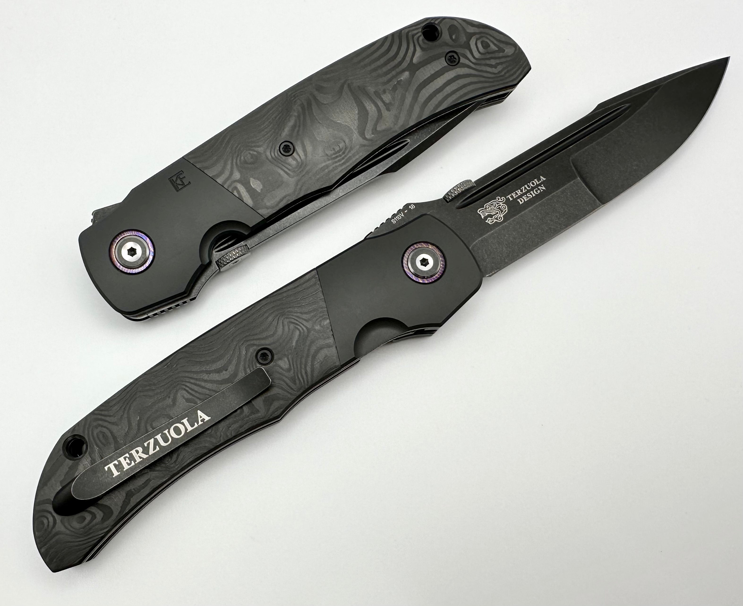 Premium Custom Knife Factory Eagle Rock: Zirconium Bolsters & Carbon Fiber Design