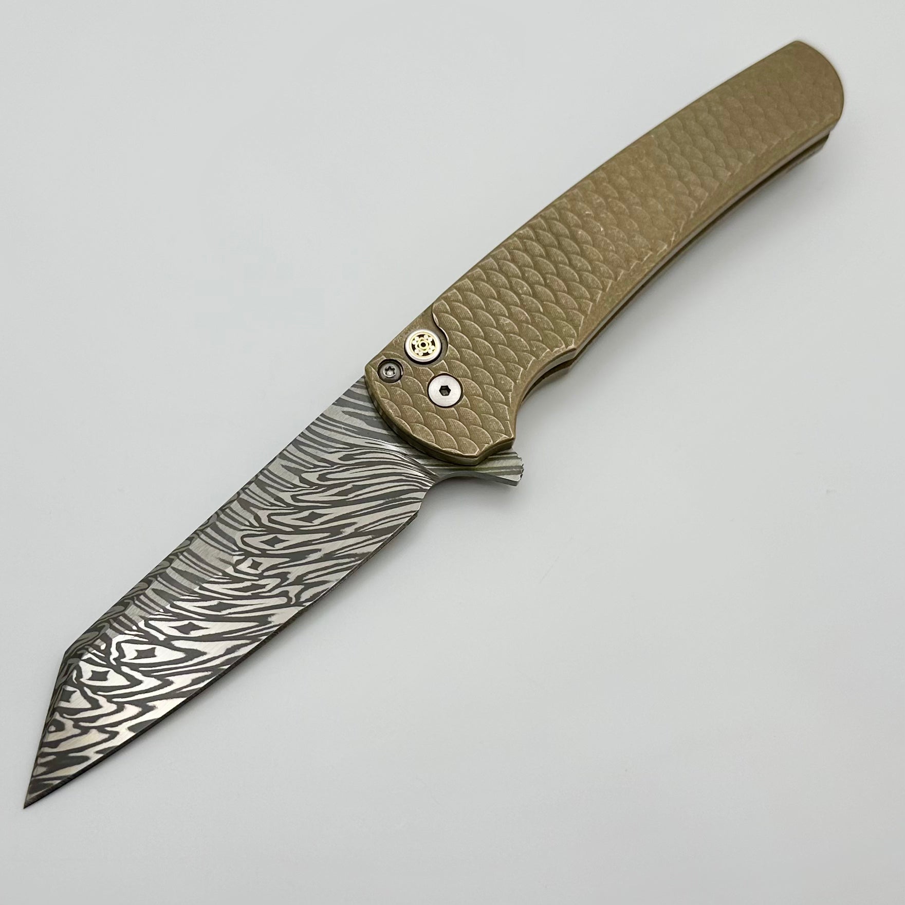 Pro-Tech Malibu Distressed AlBronze Dragon Scale Knife with Mosaic Button & Mike Irie Hand Ground Damasteel Reverse Tanto Blade - Atlanta 2024 Edition