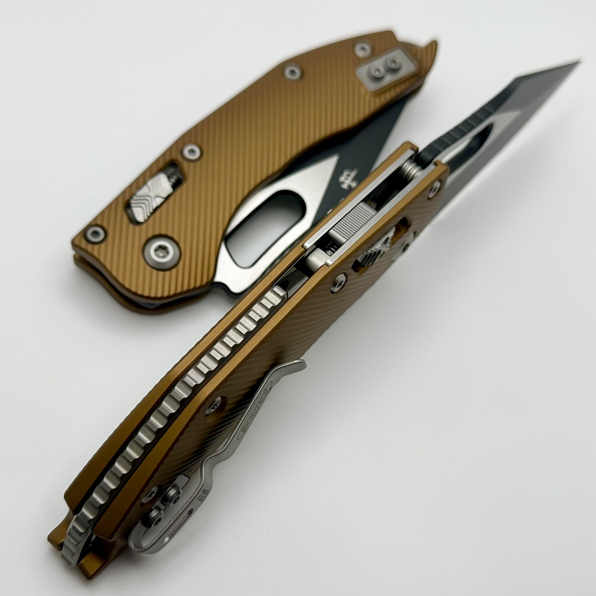 Premium Microtech Stitch RAM LOK Knife - Tan Aluminum & Two-Tone Black Serrated Blade