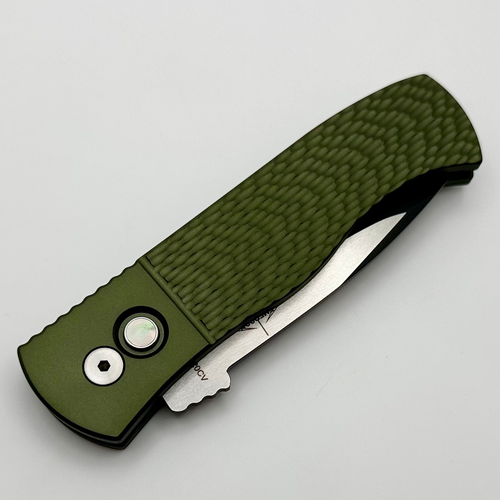 Pro-Tech Emerson CQC7 Auto Spearpoint: Premium Tactical Knife with Jigged Green Handle & 2-Tone 20CV Blade