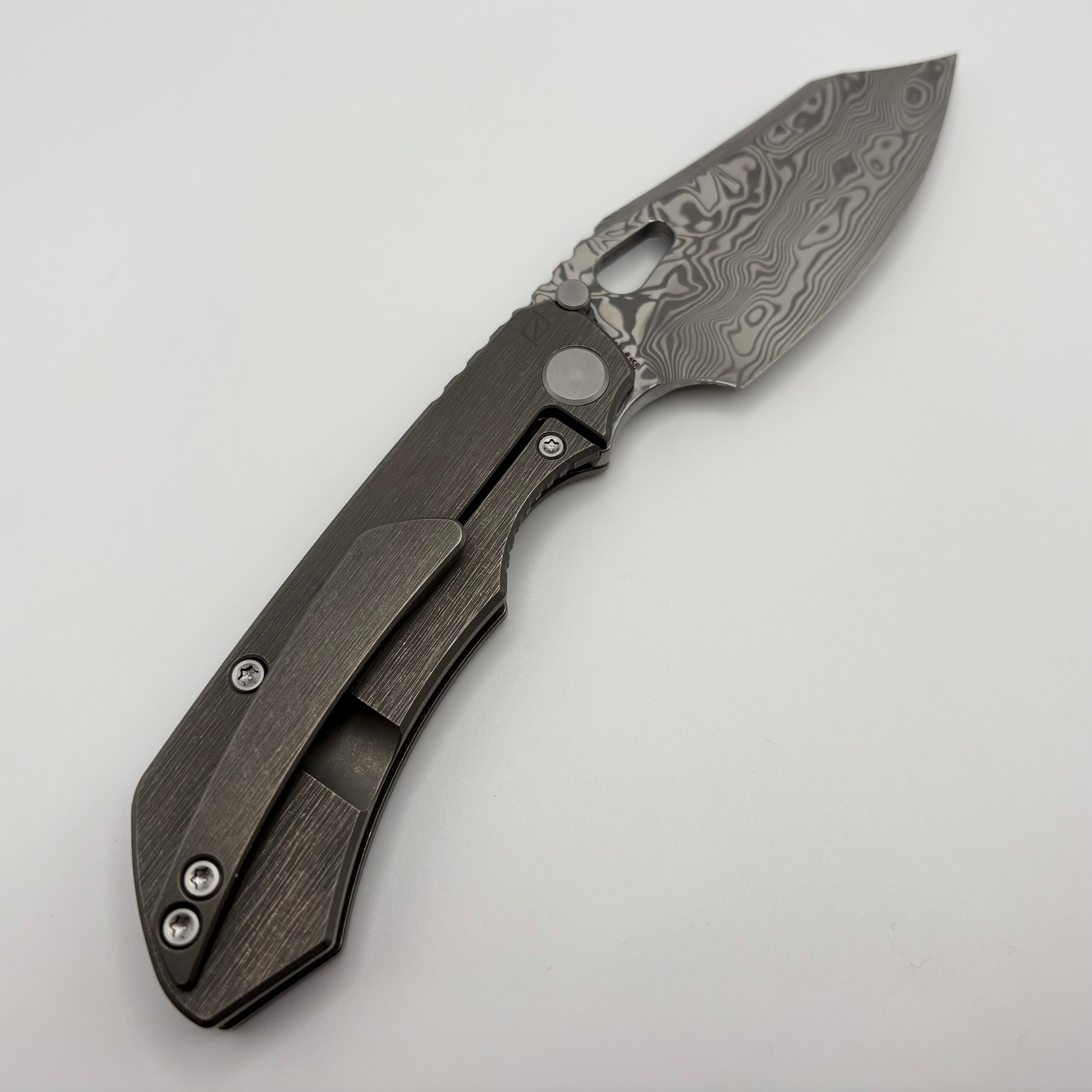 Premium Pre-Owned Custom Knife Factory Rotten Design Evo 4.0 - Ultimate Damasteel Blade with Tumbled Titanium Handles