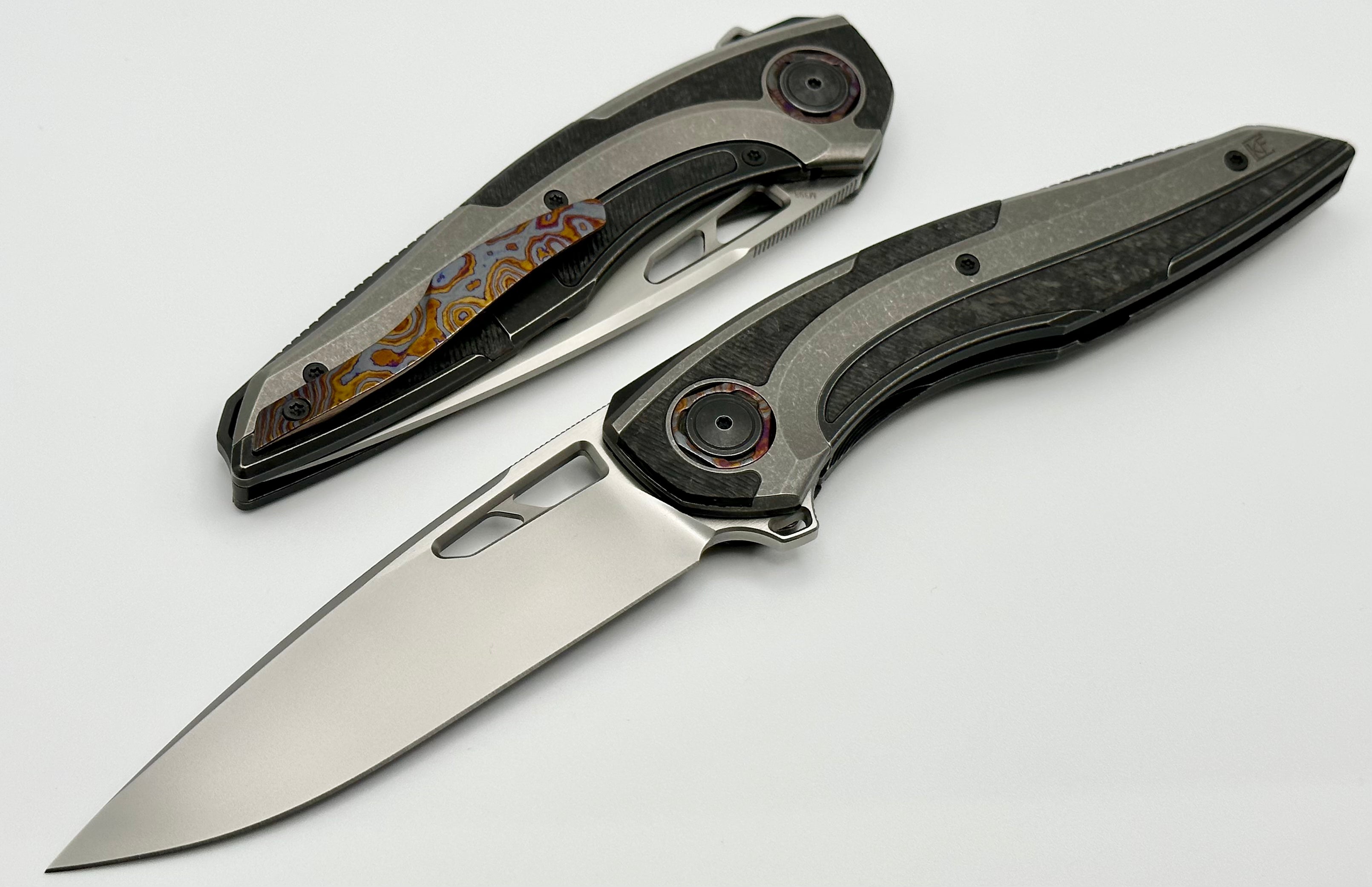 Custom Knife Factory Sukhoi-4 Titanium & Carbon Fiber Folding Knife - Premium M398 Blade