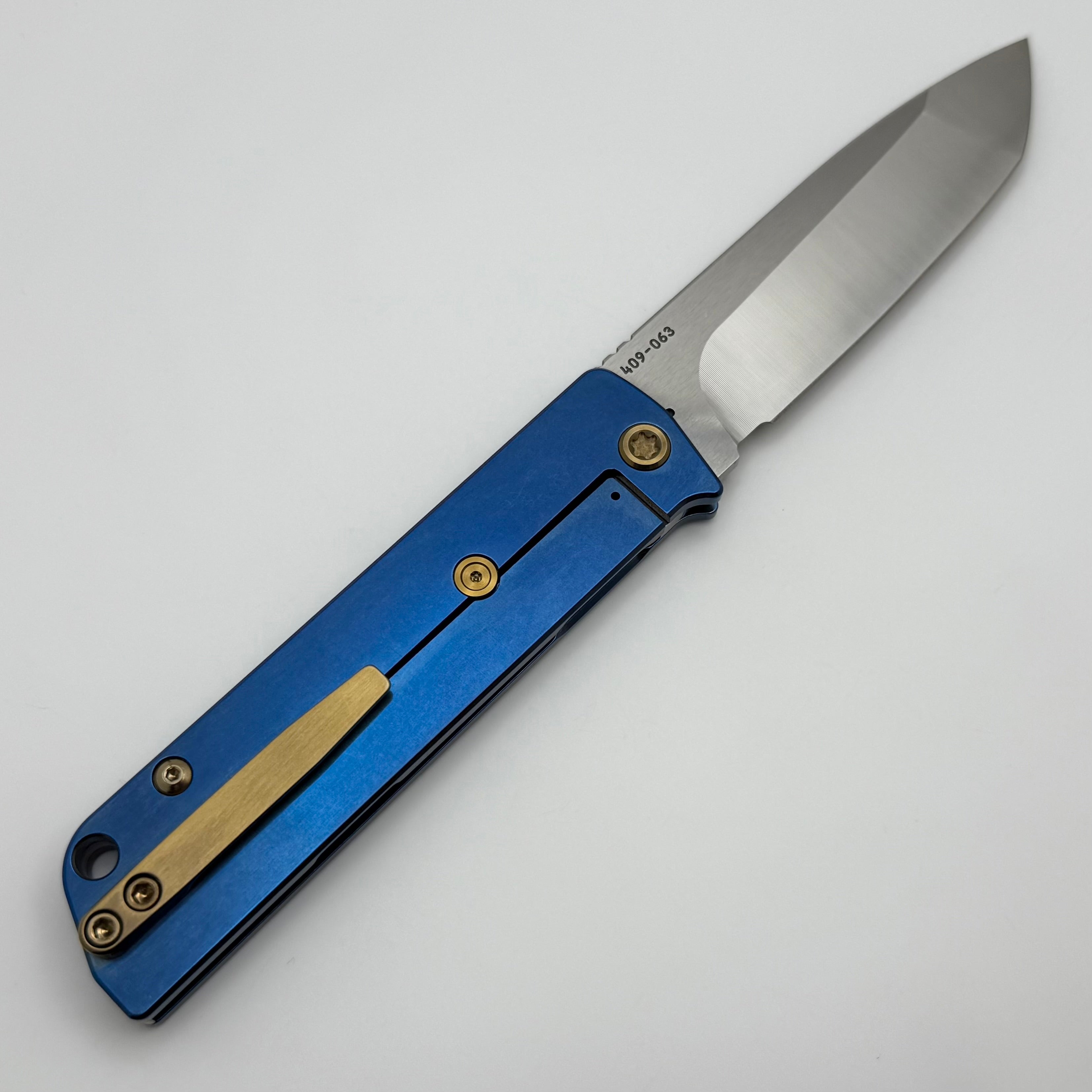 Medford Antik Premium Front Flipper Knife - S45VN Tanto Blade & Blue Titanium Handles with Bronze Hardware