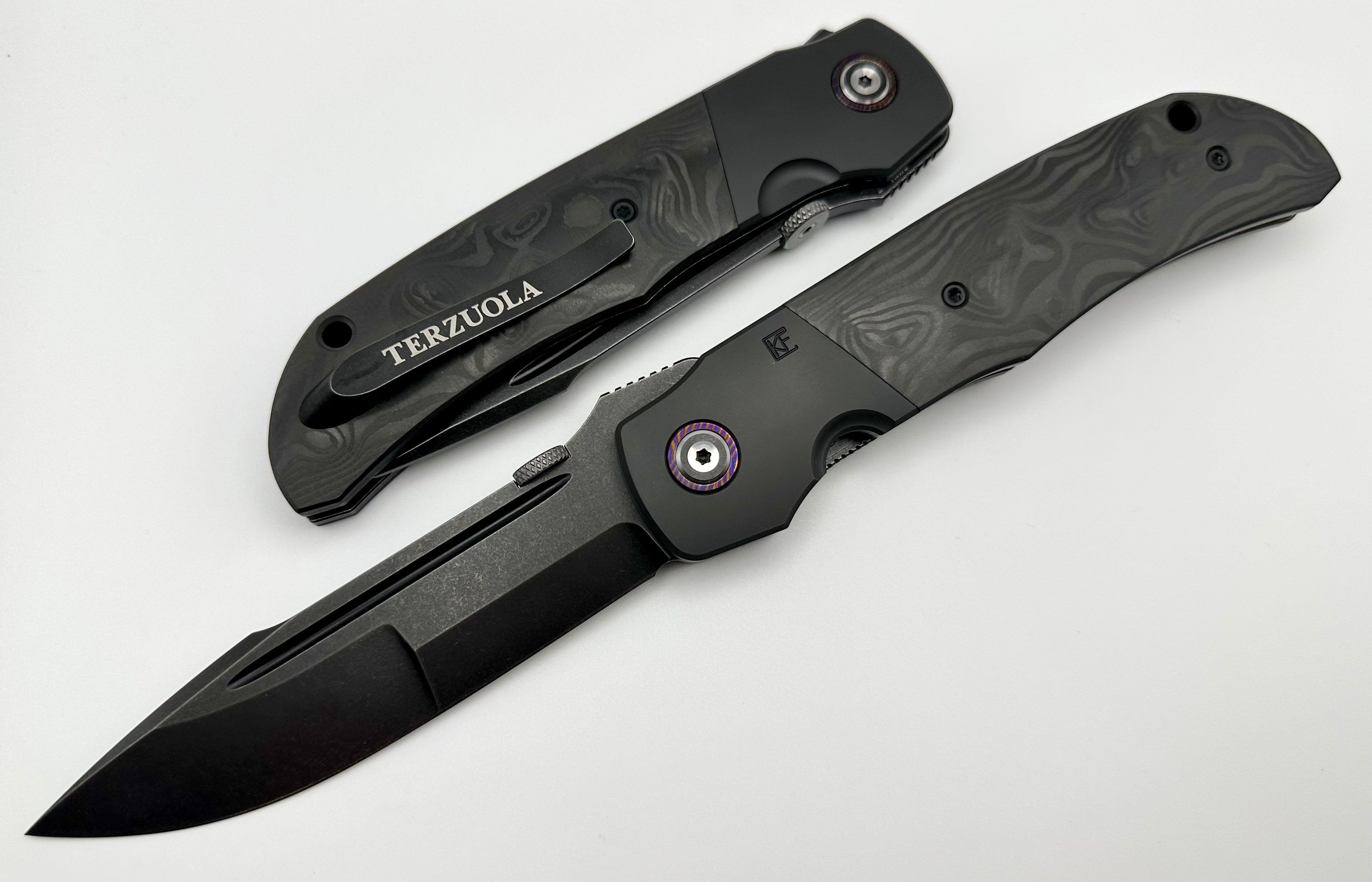 Premium Custom Knife Factory Eagle Rock: Zirconium Bolsters & Carbon Fiber Design