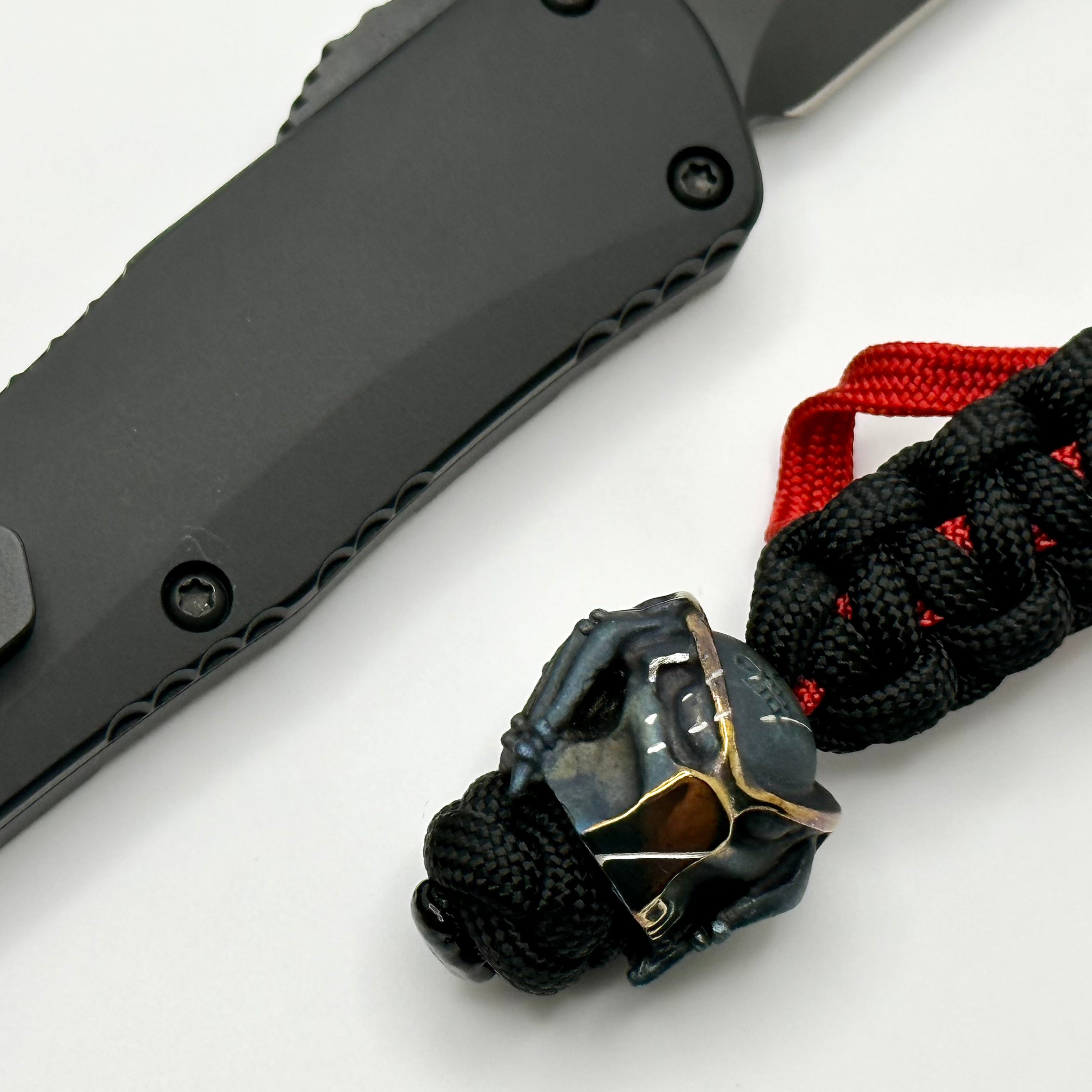 Heretic Knives Manticore E Black Predator Tanto MagnaCut Blade with Red Reticle & Cobalt Bead - Pre-Owned Tactical OTF Knife