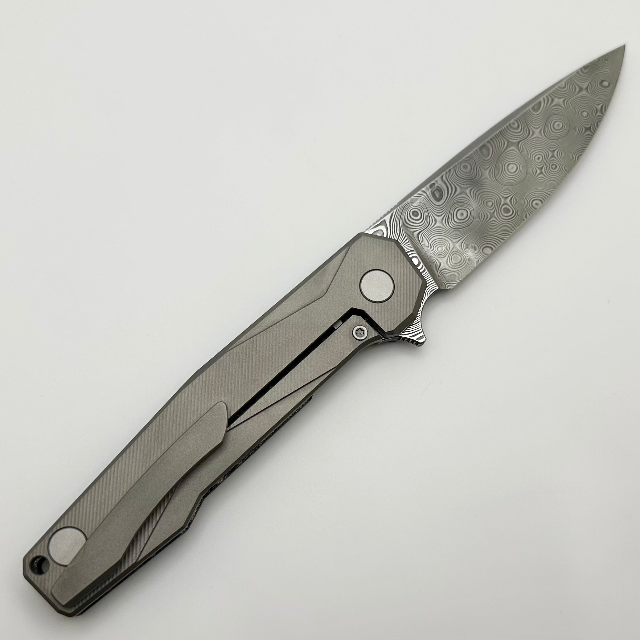 Ultimate Uldanov R1 Custom Knife: Titanium & Polar Dark Matter Carbon Fiber with Damascus Blade