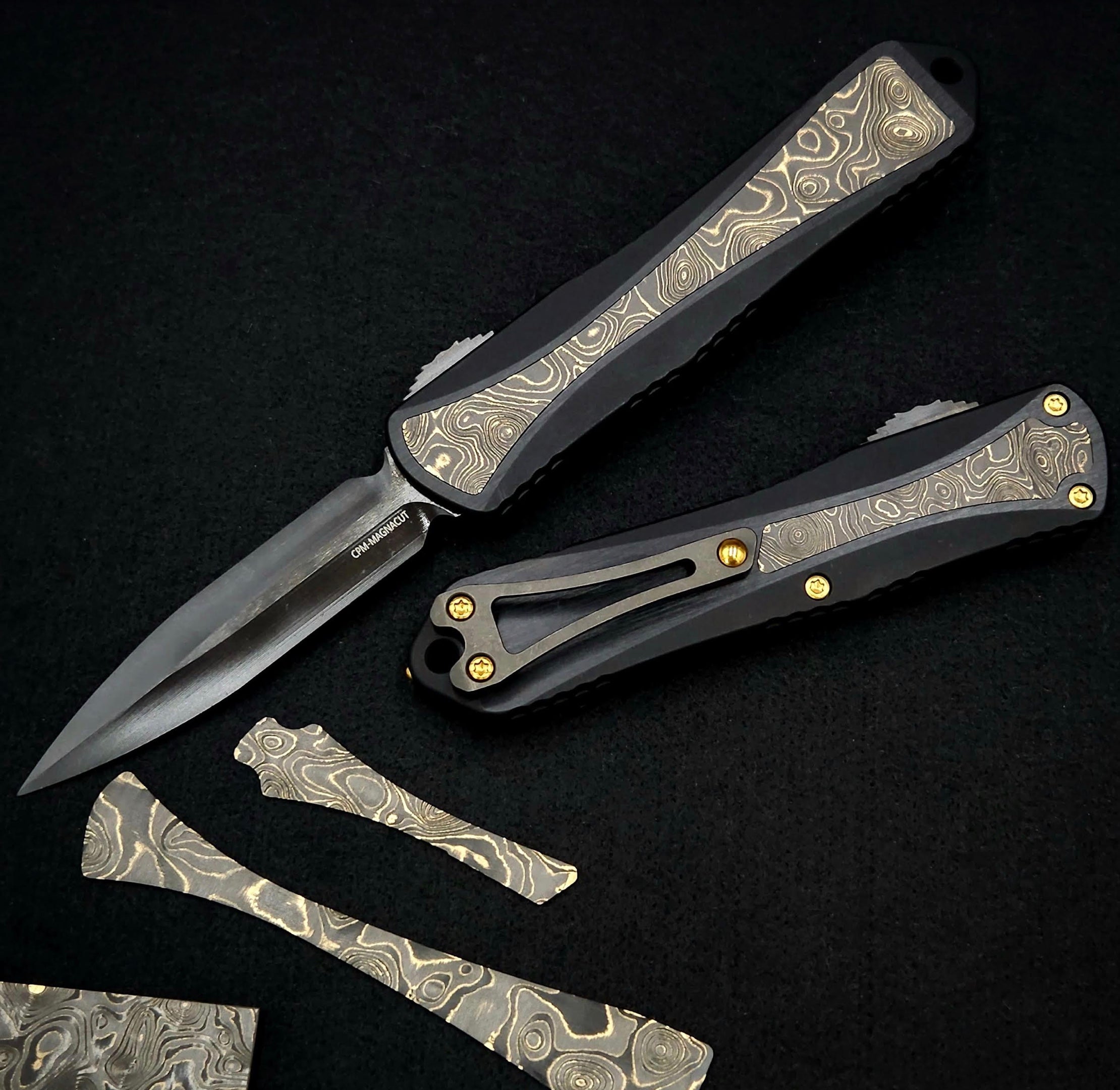 Heretic Knives Manticore E Ultimate Tactical OTF Knife - Black Fat Carbon Gold Dunes Inlays & DLC MagnaCut