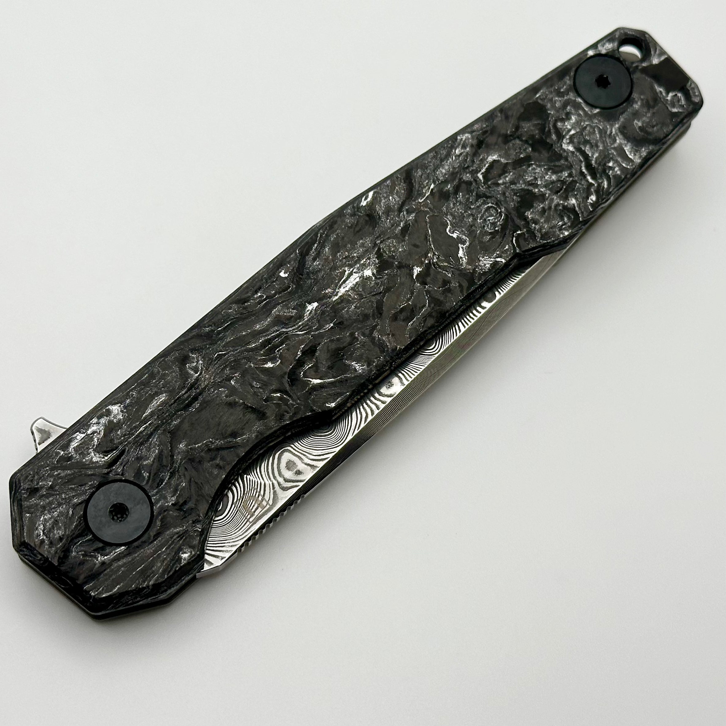 Ultimate Uldanov R1 Custom Knife: Titanium & Polar Dark Matter Carbon Fiber with Damascus Blade