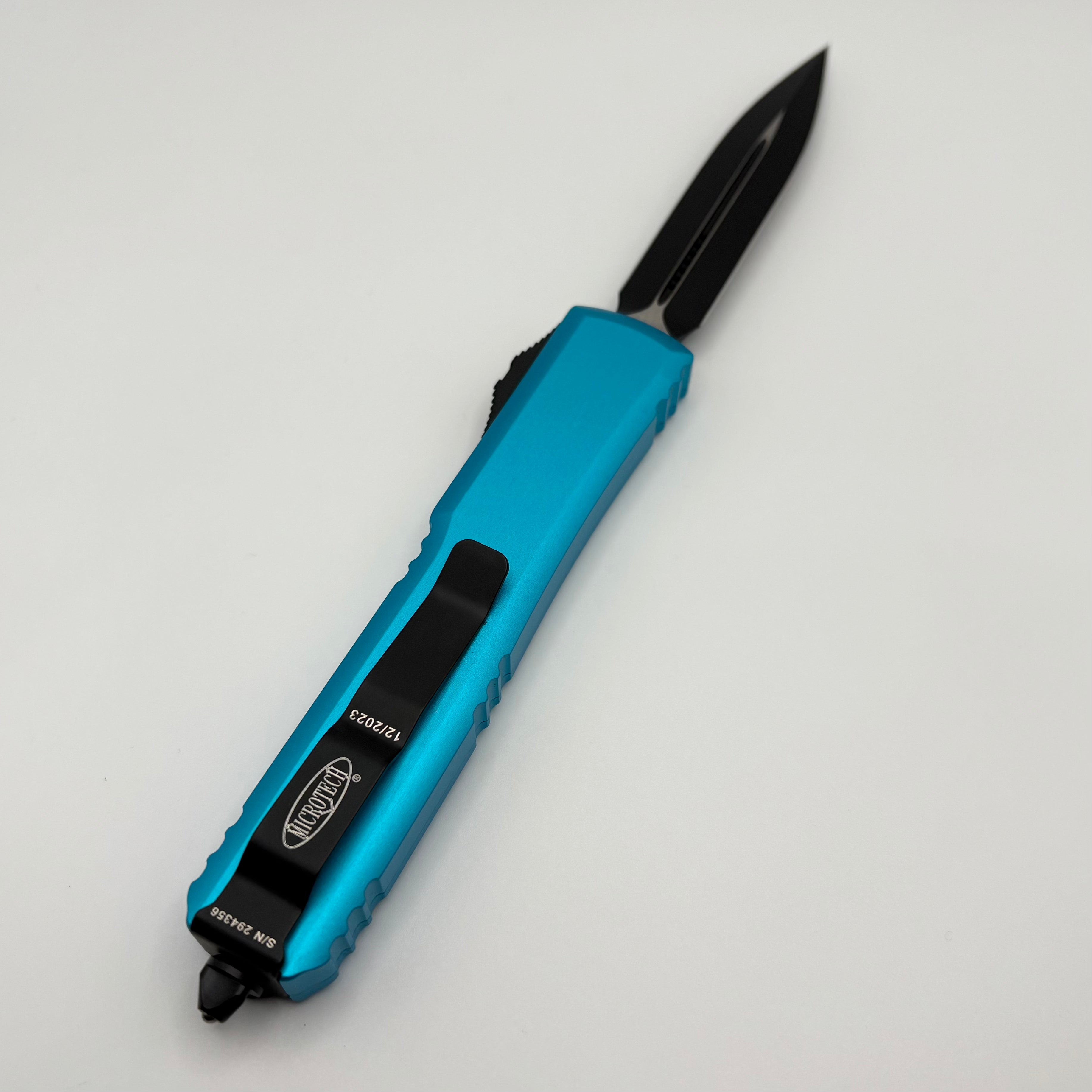 Premium Pre-Owned Microtech Ultratech D/E Turquoise Standard 122-1TQ - Ultimate OTF Knife