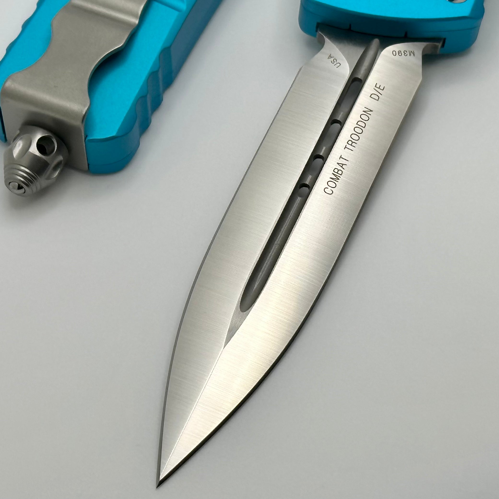 Premium Microtech Combat Troodon D/E Turquoise Satin Knife - Ultimate Tactical Tool