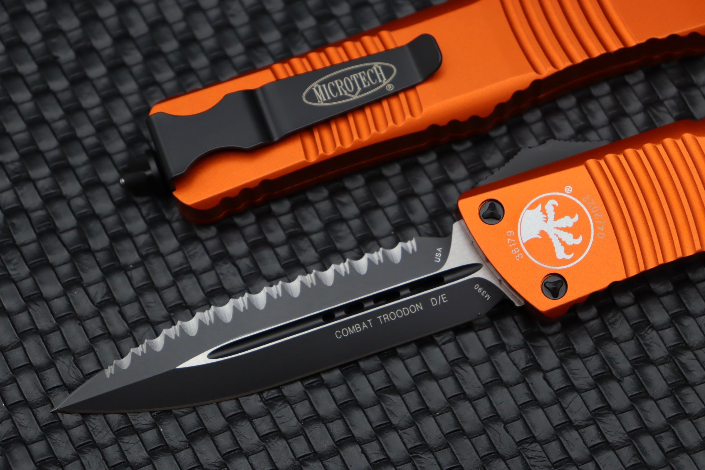 Premium Microtech Combat Troodon - Black Double Edge Fully Serrated & Orange Handle