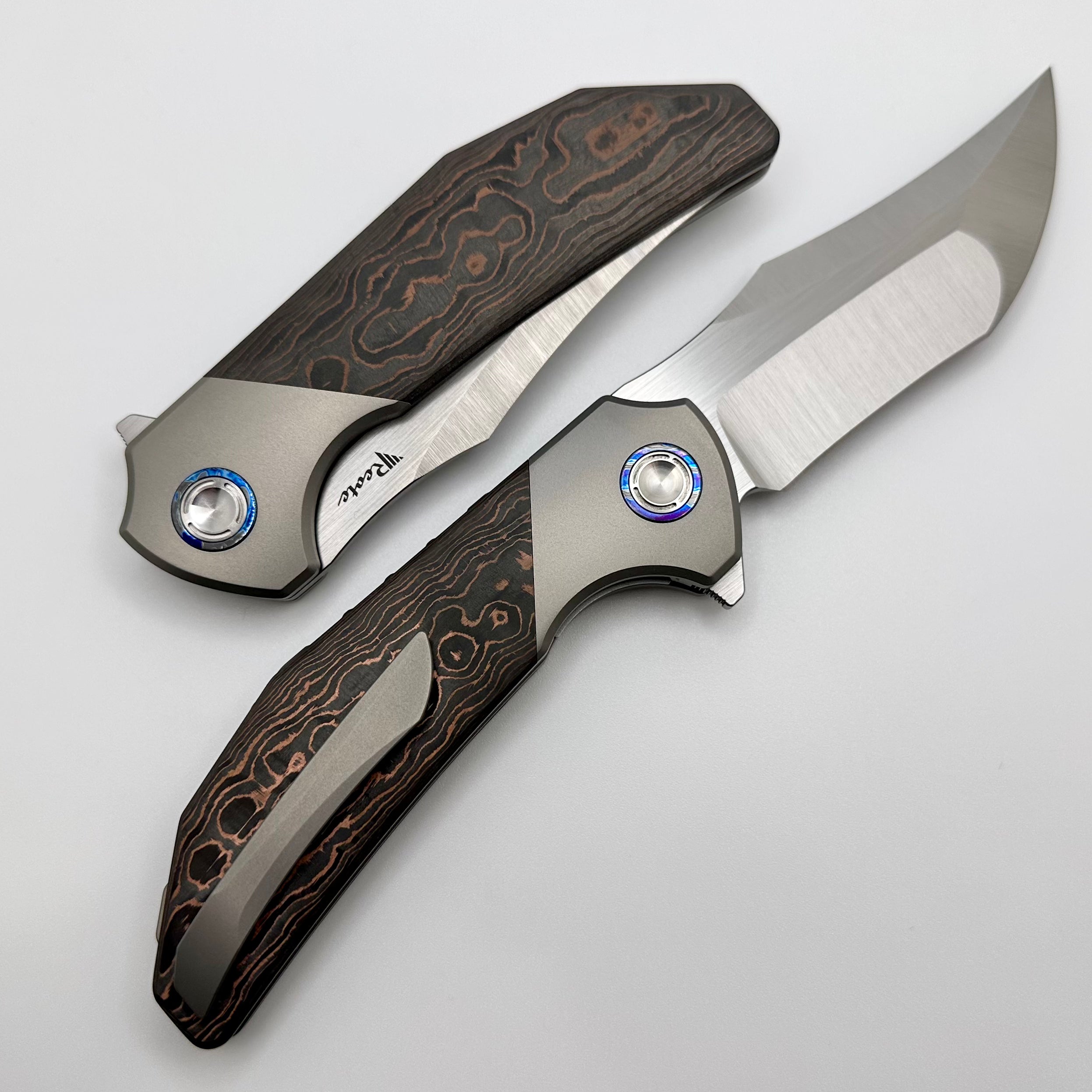 Reate Knives Premium Tiger Copper Camo Folding Knife - M390 Steel & Fat Carbon Handle