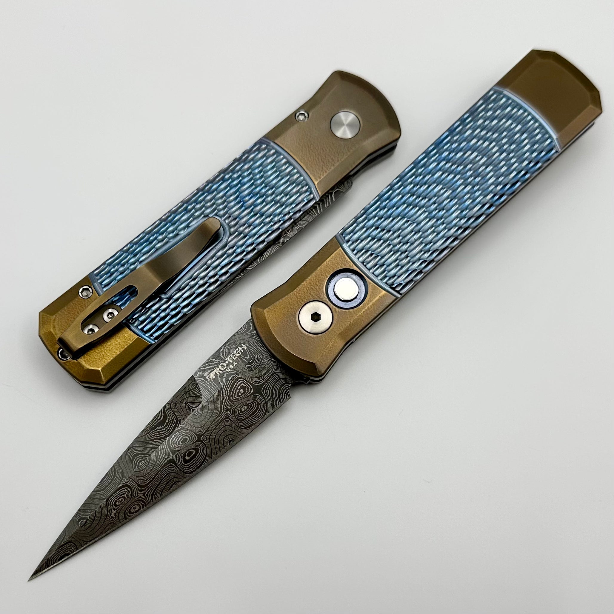 Ultimate Pro-Tech Godson Custom Knife: Bronze Ti Bolsters, Blue Jigged Ti, Pearl Button & Nichols Damascus Blade
