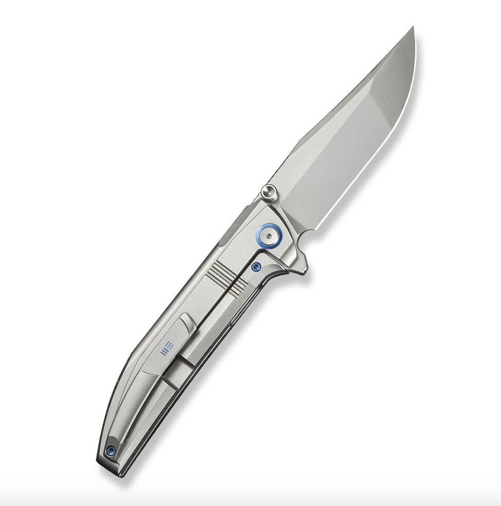 WE Knife Ezinta Flipper: Premium Titanium Integral Handle with Blue Accents & M390 Blade