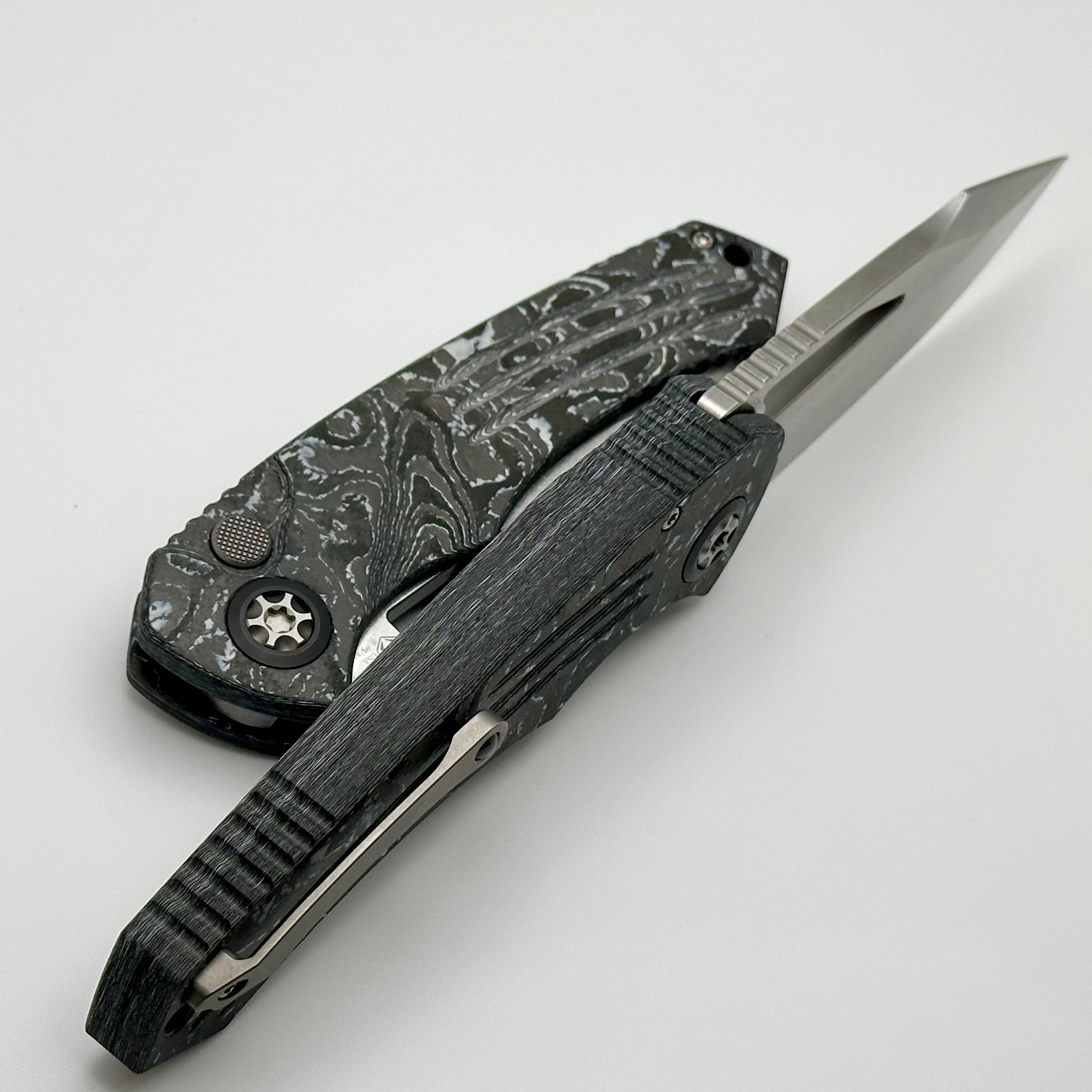 Heretic Knives Pariah M/A Ultimate Button Lock Folding Knife - White Camo Carbon Handles with Stonewash MagnaCut Blade