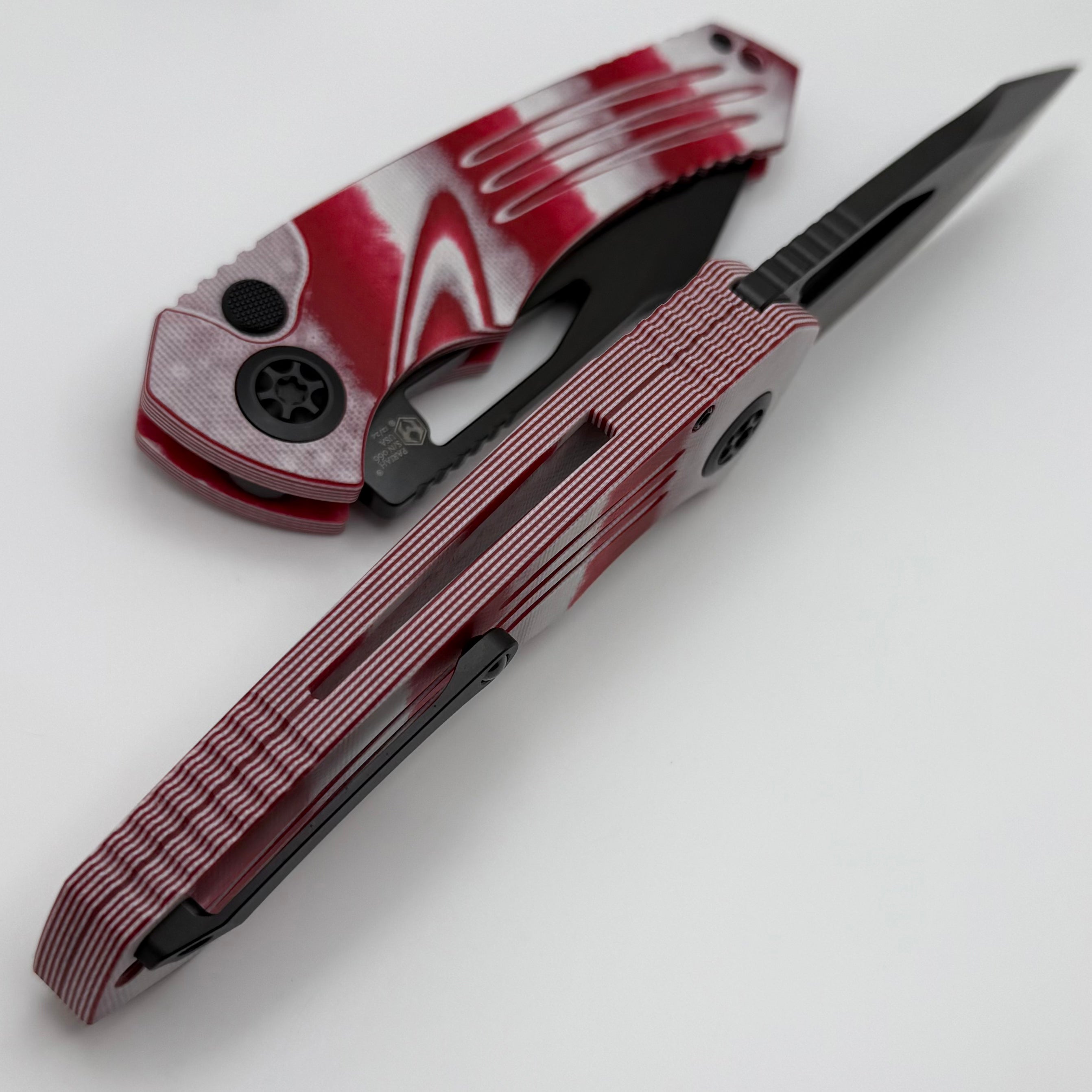 Heretic Knives Pariah M/A Ultimate Button Lock Folding Knife - Candy Cane G-10 Handles & DLC MagnaCut Blade