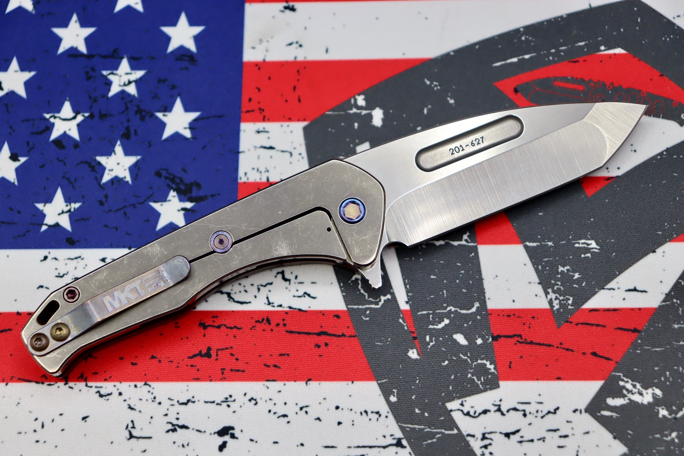 Premium Medford Swift FL Framelock Flipper: Drop Point S35VN Blade & Red Handle with Flamed Hardware