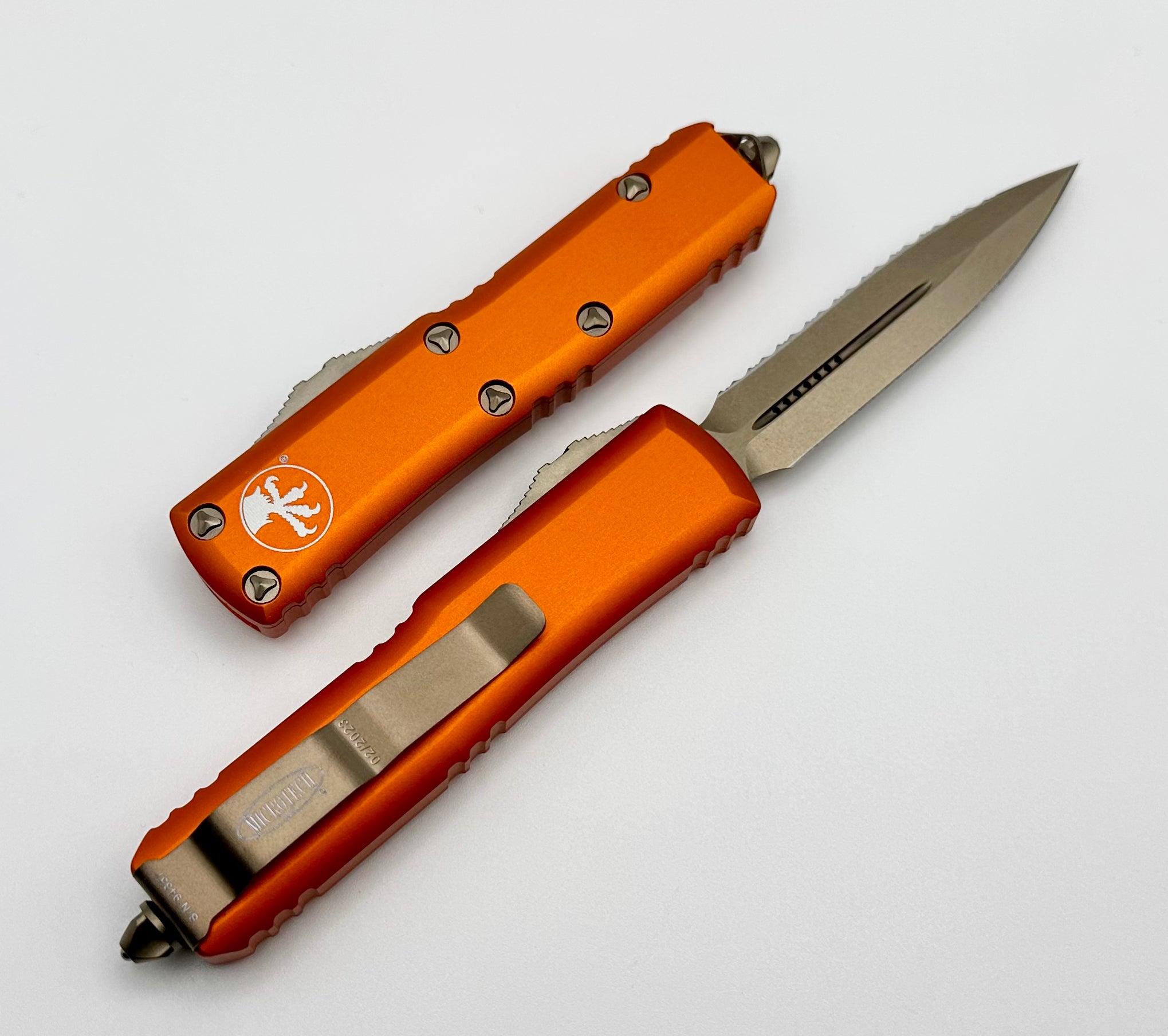 Microtech UTX-85 Premium EDC Knife - Bronze Double Edge, Full Serrated & Orange Handle