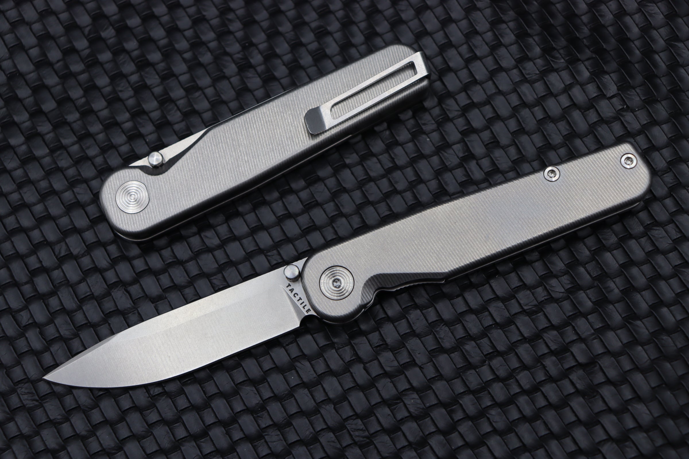 Ultimate Tactile Turn Rockwall Thumbstud Titanium & Magnacut Knife