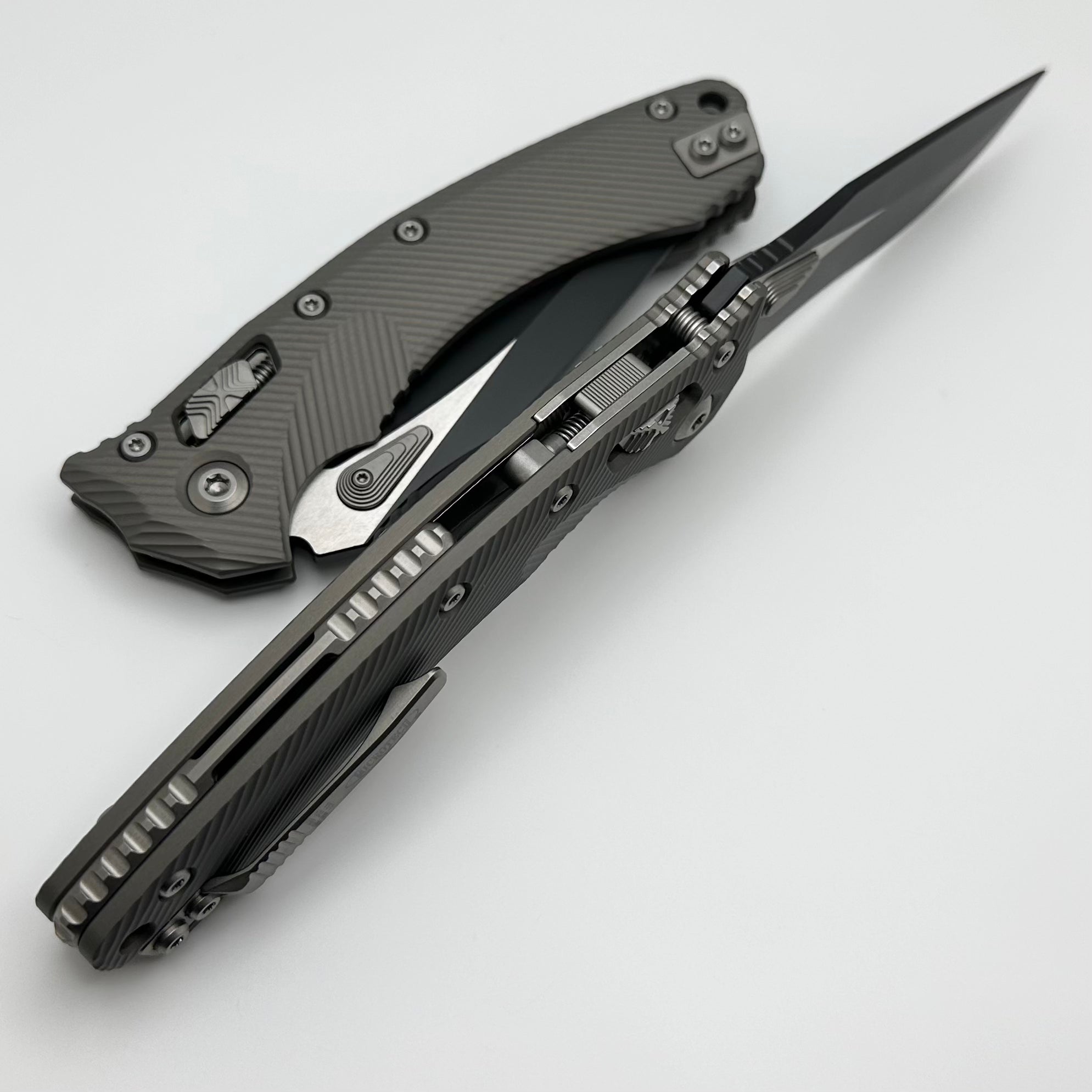 Premium Microtech Amphibian RAM LOK Knife - Clear Fluted Aluminum & Black Serrated M390MK Blade