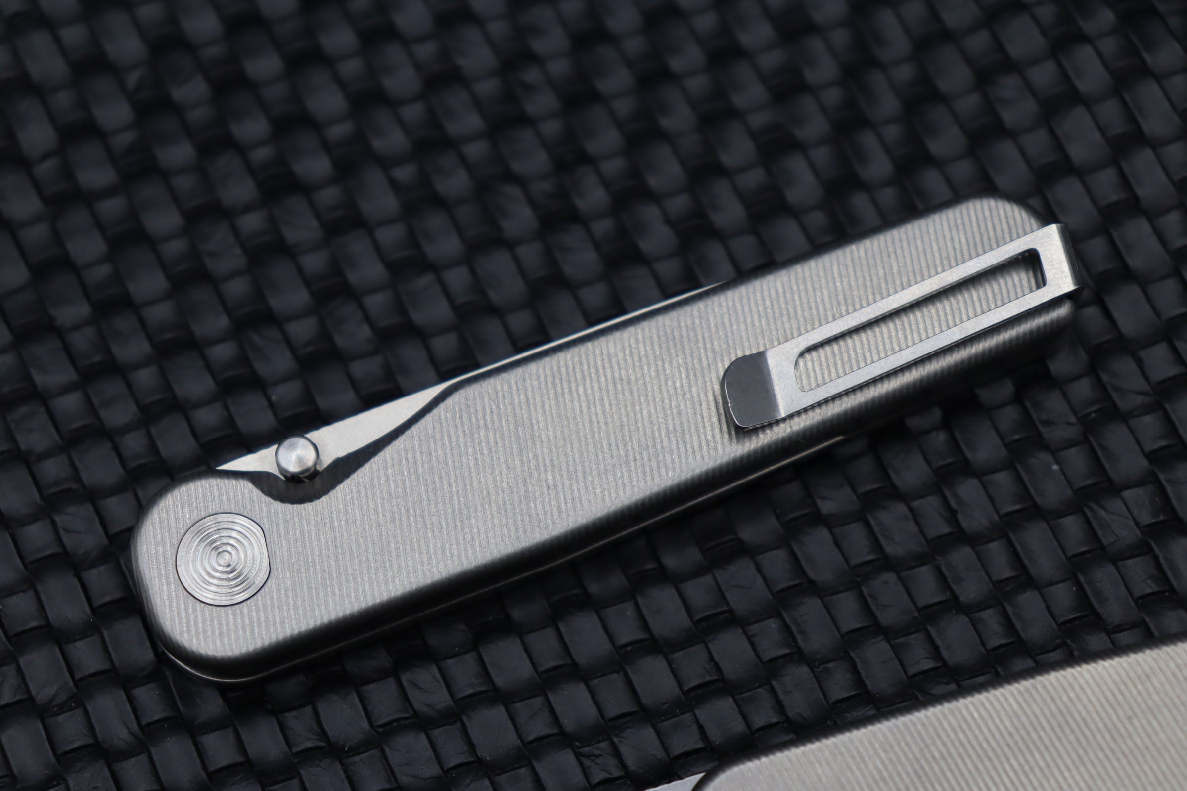 Ultimate Tactile Turn Rockwall Thumbstud Titanium & Magnacut Knife