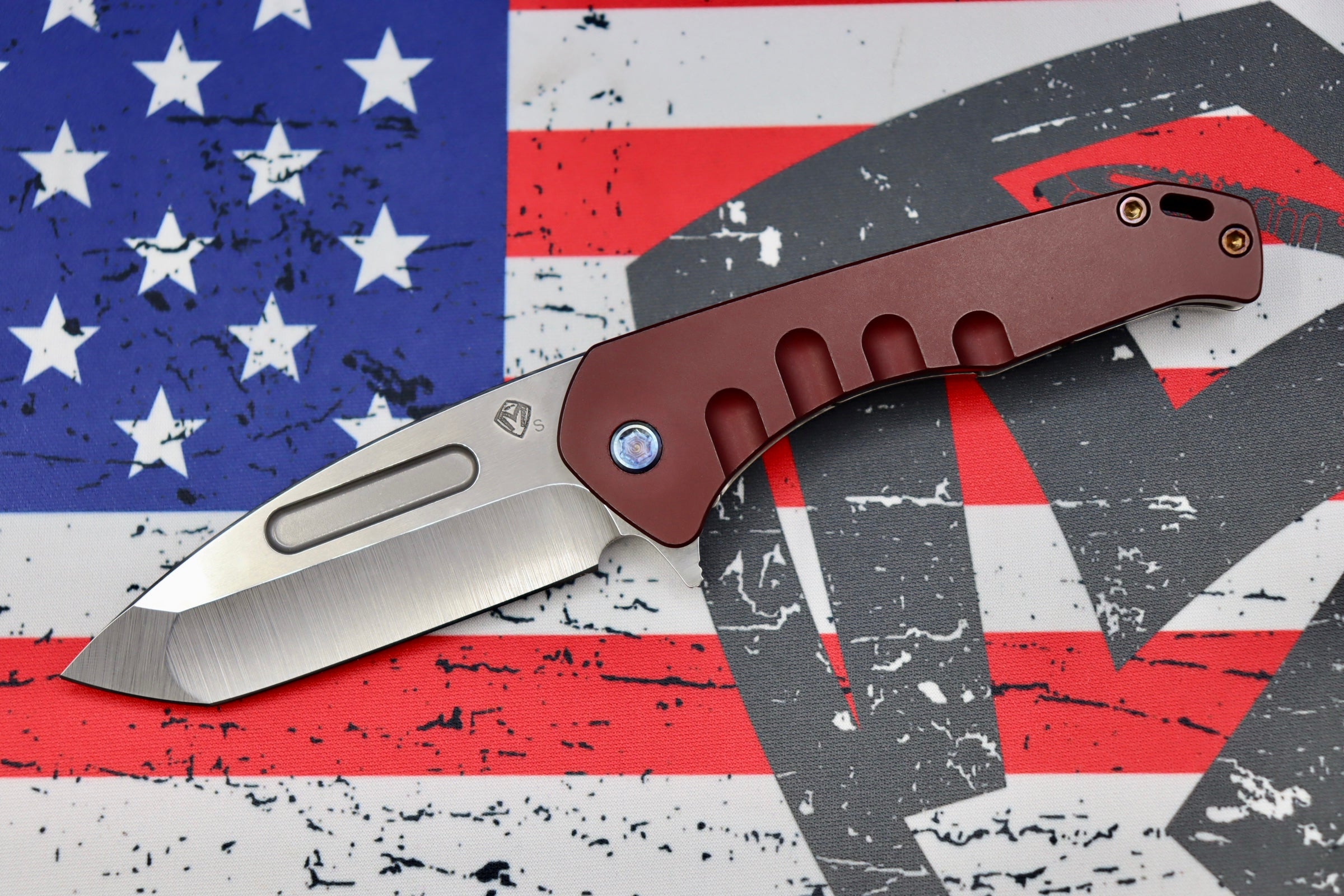 Premium Medford Swift FL Framelock Flipper: Drop Point S35VN Blade & Red Handle with Flamed Hardware