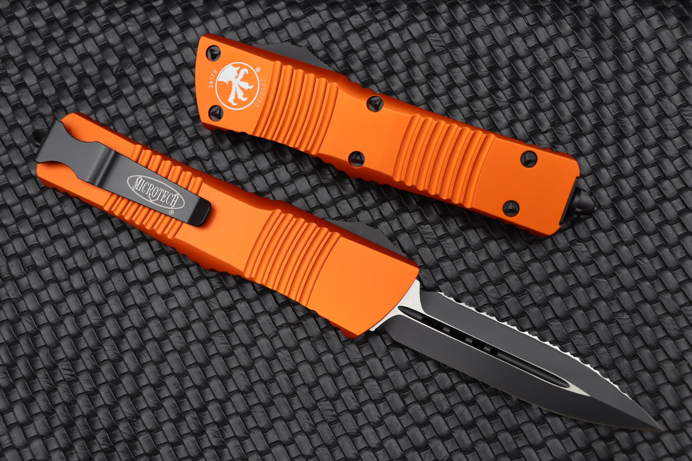 Premium Microtech Combat Troodon - Black Double Edge Fully Serrated & Orange Handle