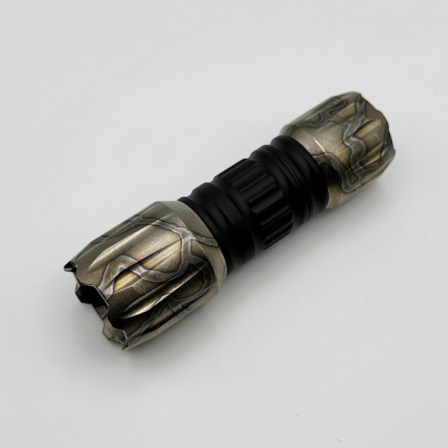 Heretic Knives Hyperion Ultimate Flashlight with Flamed Titanium Design