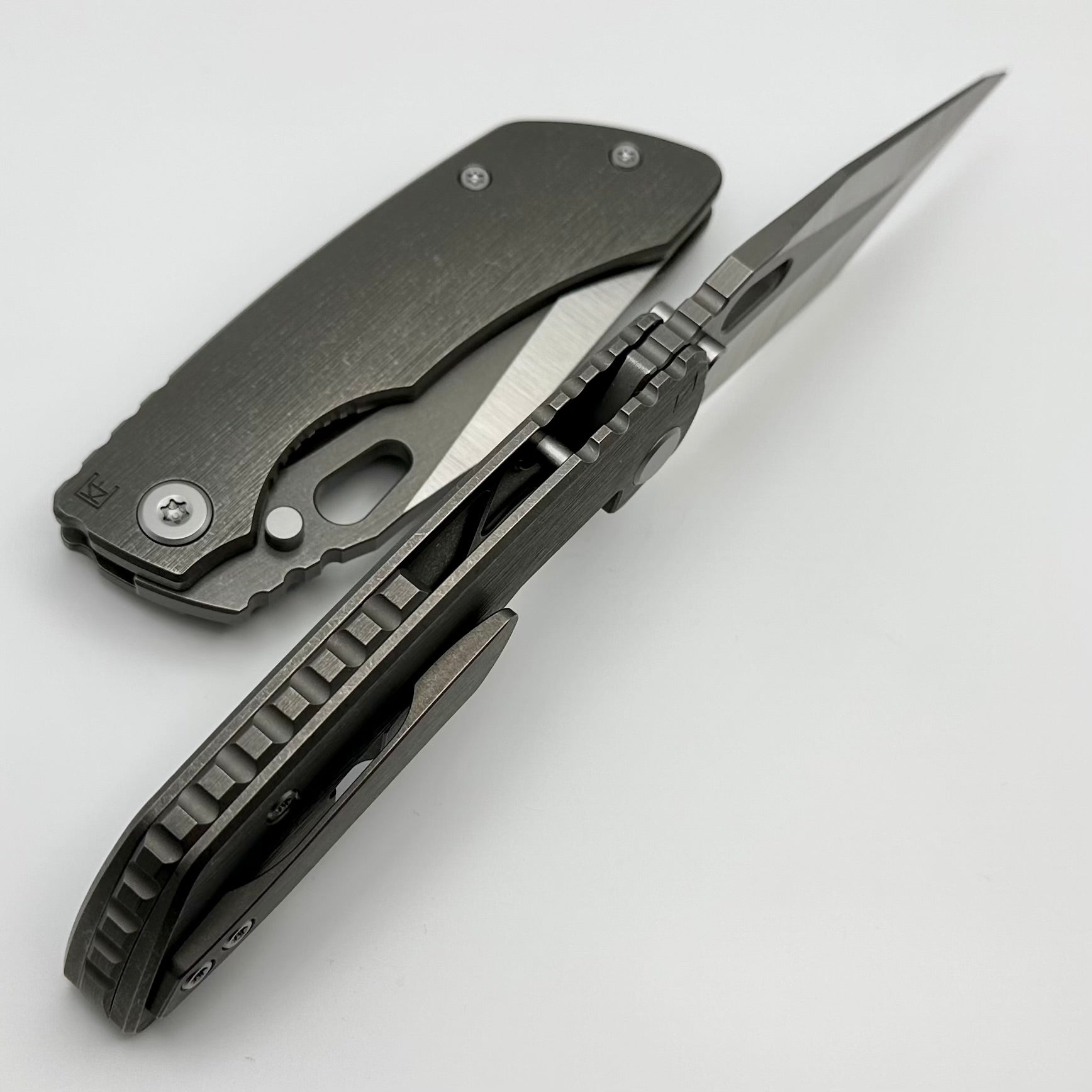 Custom Knife Factory Rotten Evo T - Premium S90V Blade with Titanium Handles