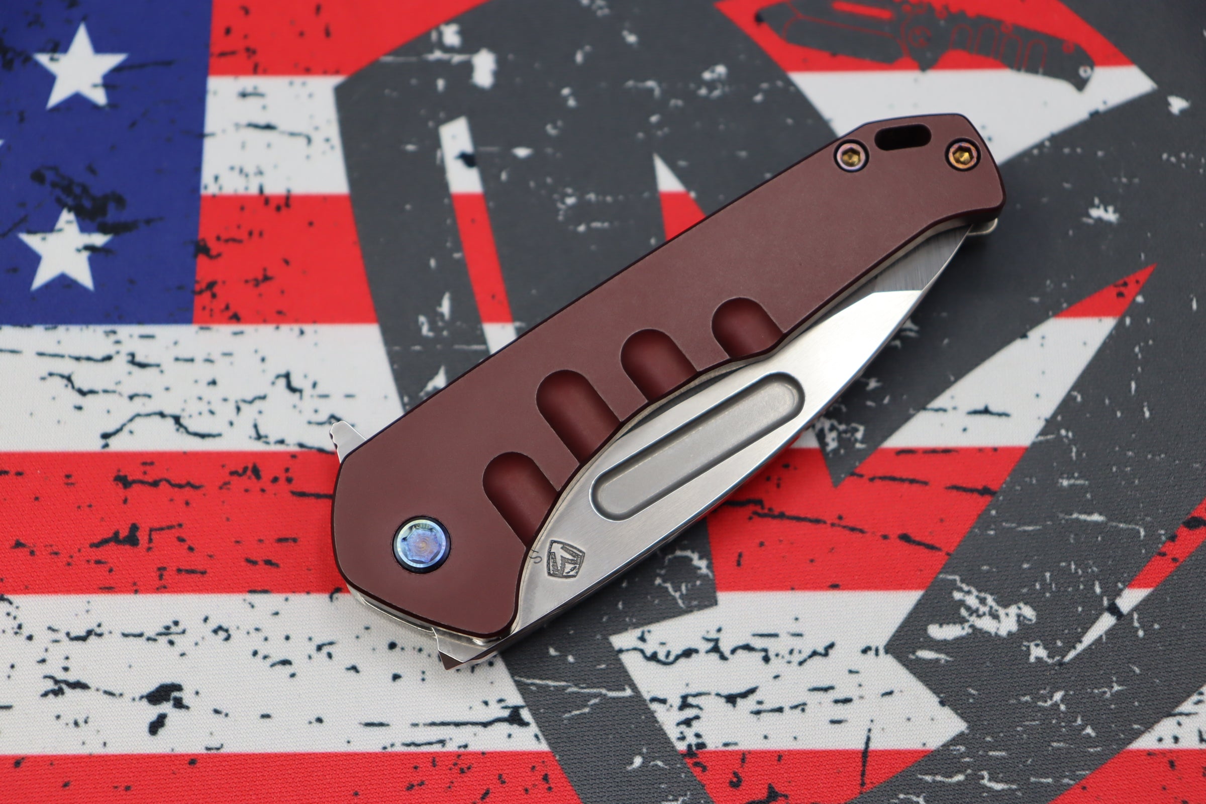 Premium Medford Swift FL Framelock Flipper: Drop Point S35VN Blade & Red Handle with Flamed Hardware