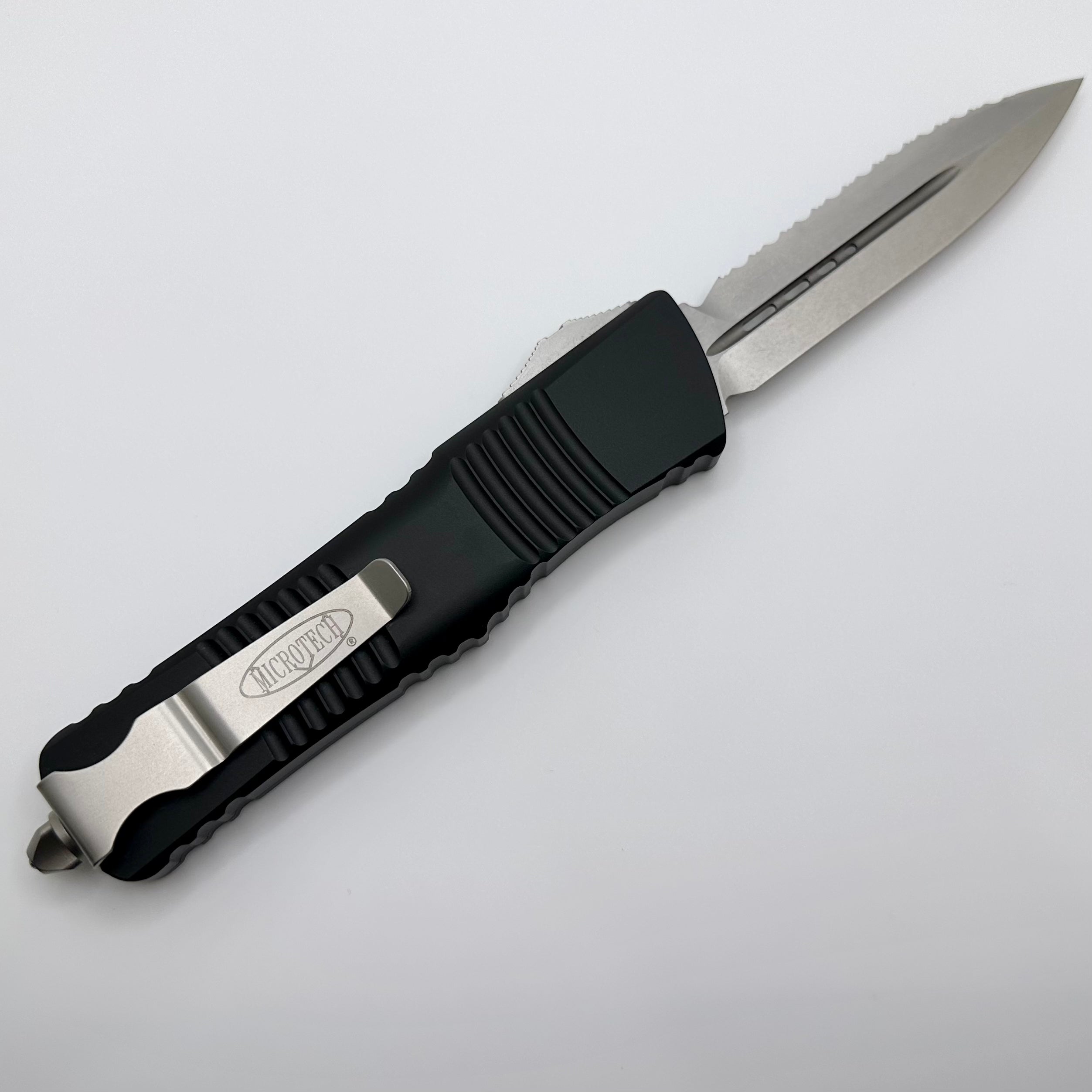 Premium Pre-Owned Microtech Combat Troodon Black Double Edge Stonewash Full Serrated 142-12 - Ultimate Tactical Knife