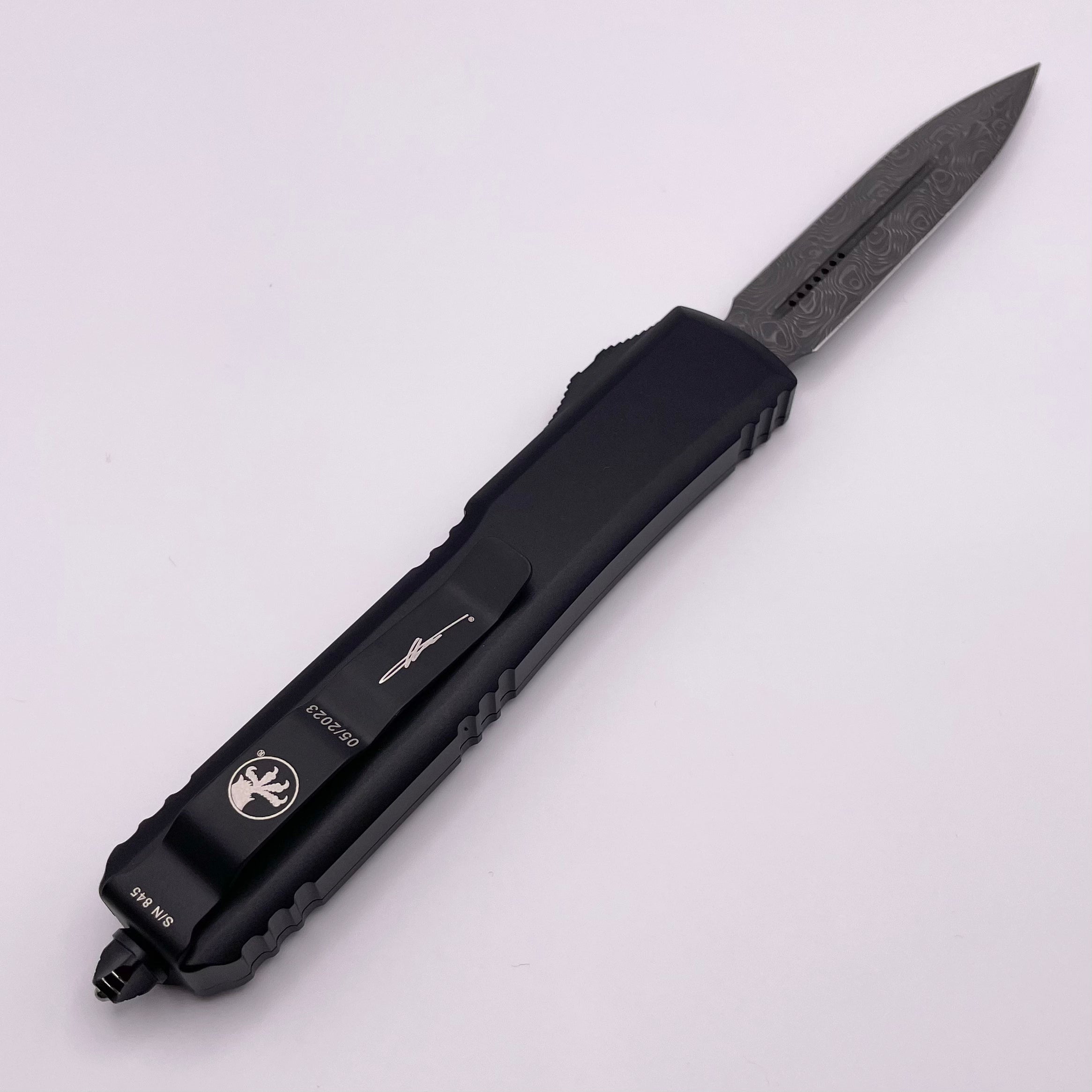 Premium Pre-Owned Microtech Ultratech Damascus Double Edge Knife - Signature Series with Black Ringed Hardware