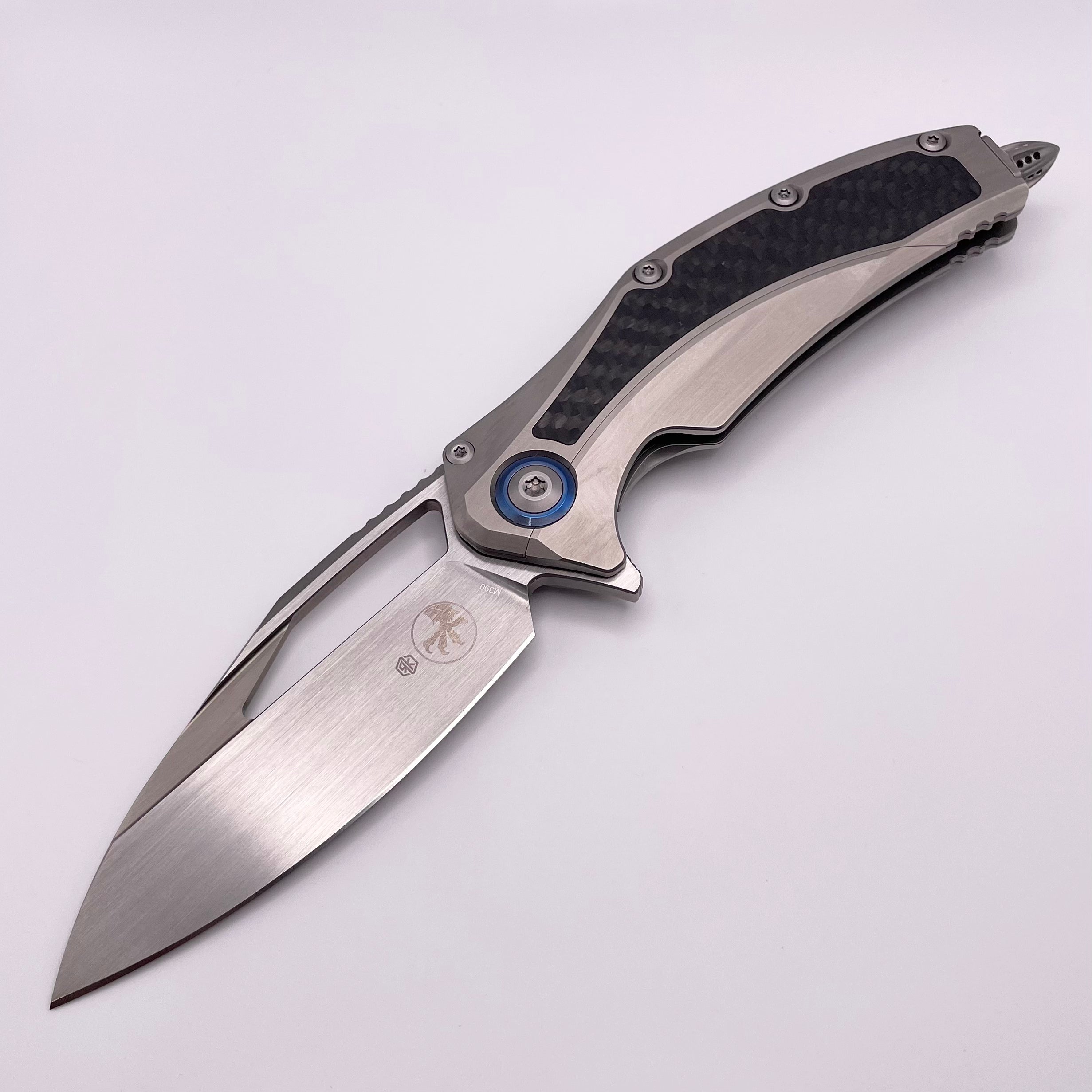 Premium Pre-Owned Microtech Matrix: Titanium & Carbon Fiber with Blue Ti Pivot Collars