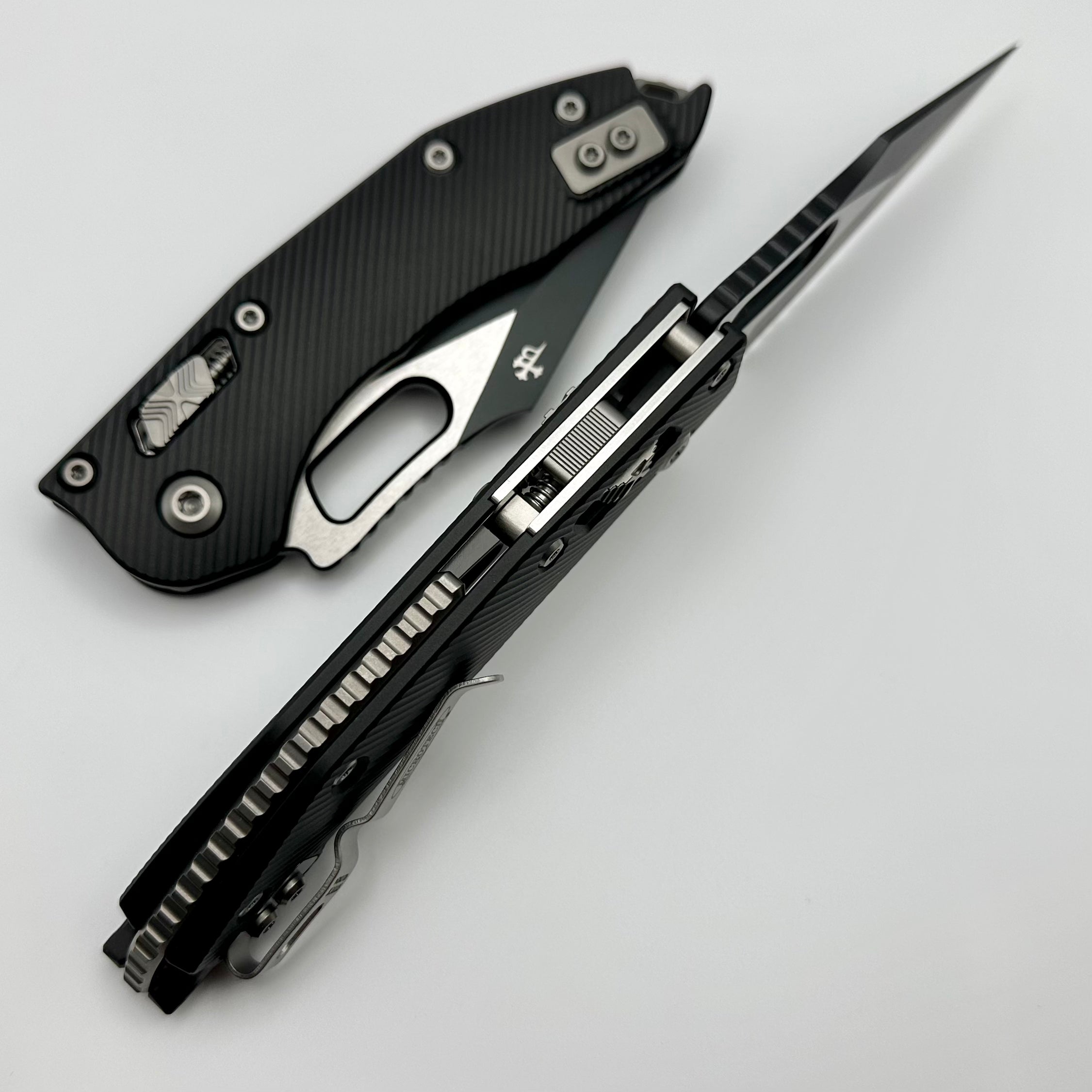 Premium Microtech Stitch RAM LOK Knife - Black Aluminum & Two-Tone Serrated Blade