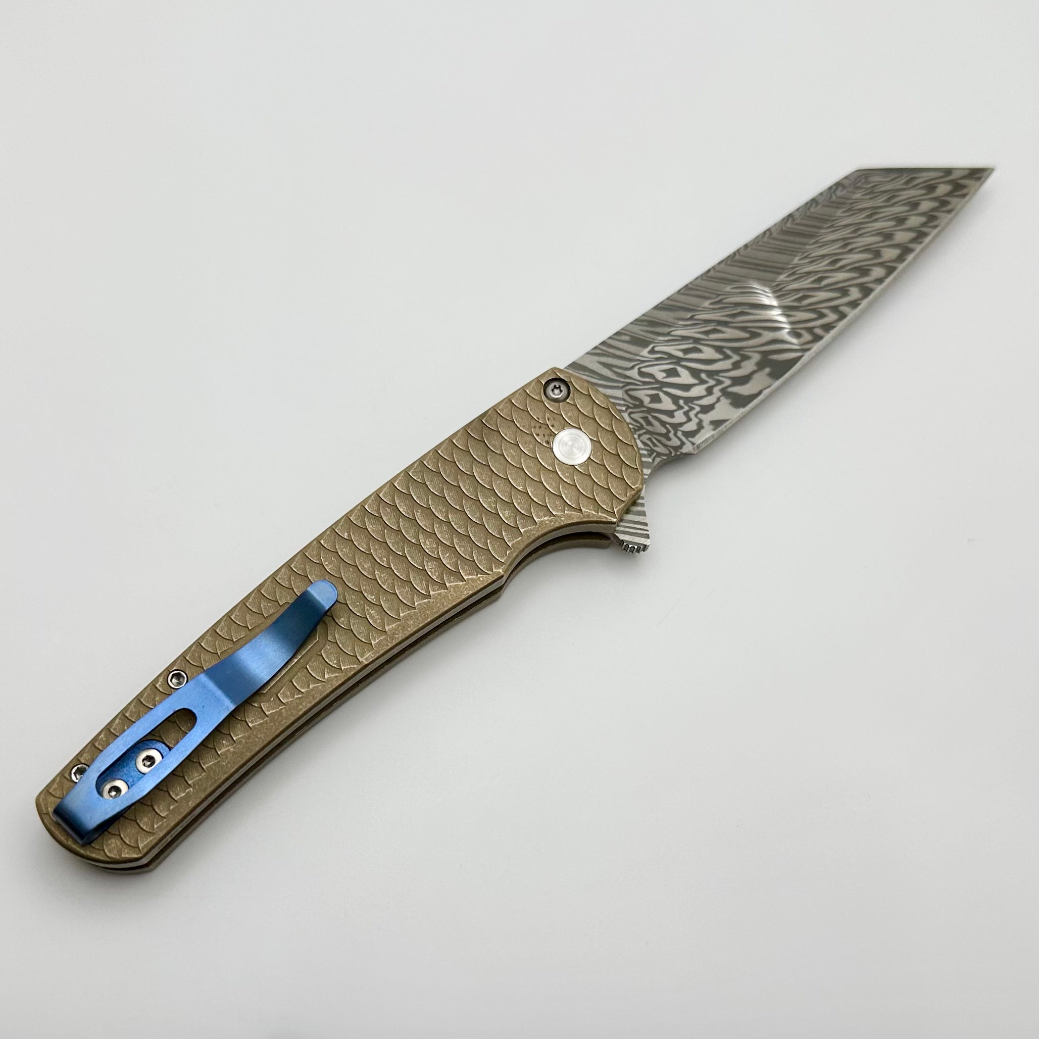 Pro-Tech Malibu Distressed AlBronze Dragon Scale Knife with Mosaic Button & Mike Irie Hand Ground Damasteel Reverse Tanto Blade - Atlanta 2024 Edition