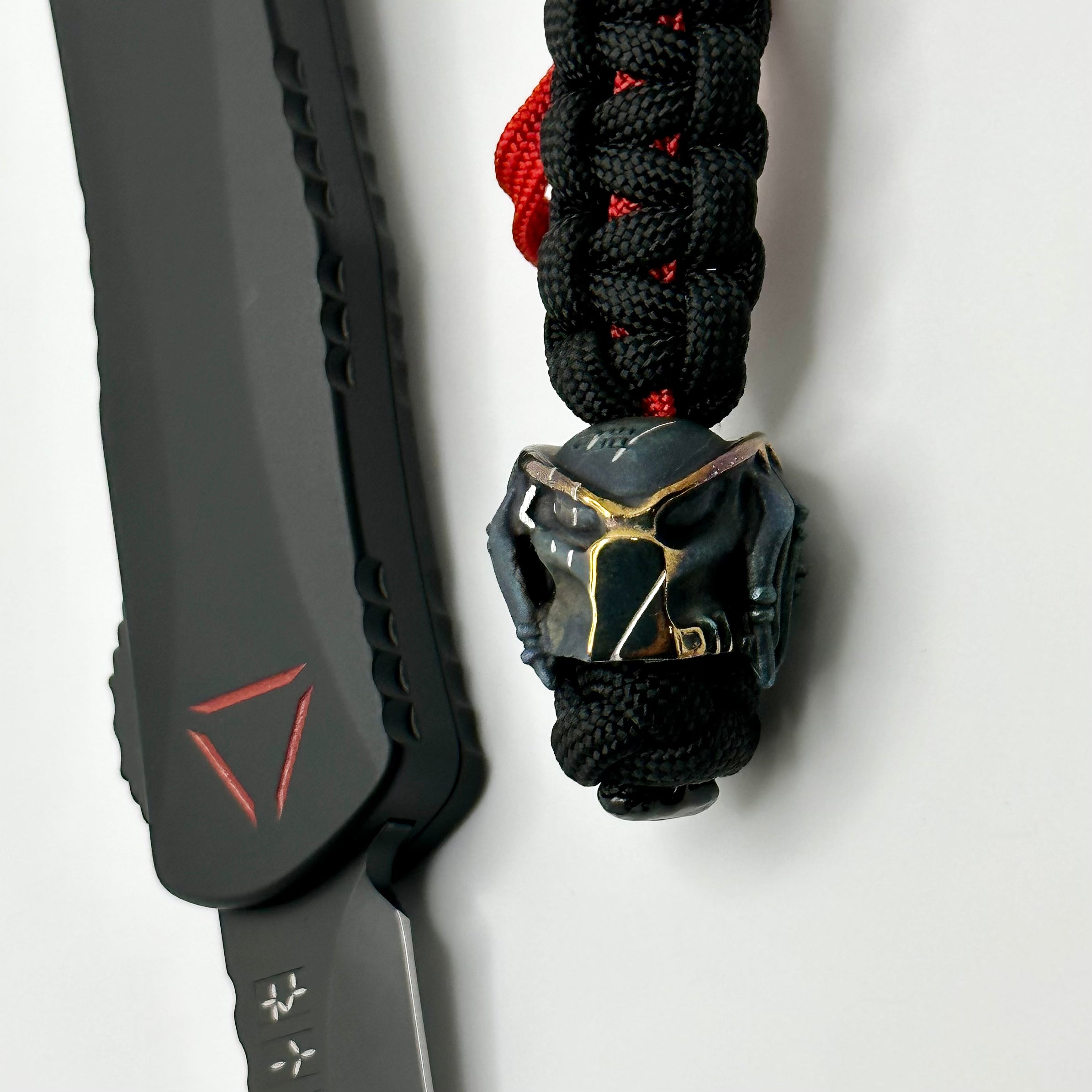 Heretic Knives Manticore E Black Predator Tanto MagnaCut Blade with Red Reticle & Cobalt Bead - Pre-Owned Tactical OTF Knife