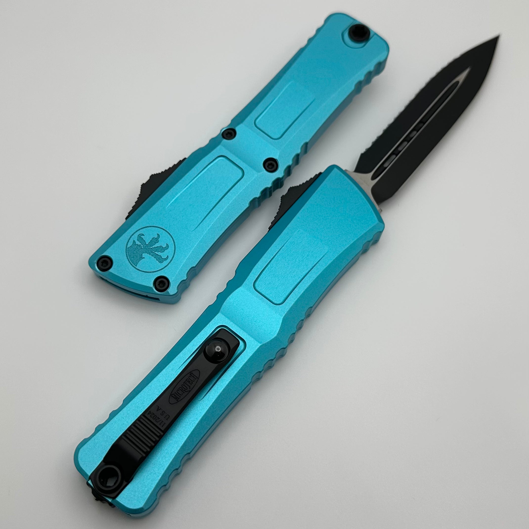 Premium Microtech Combat Troodon Gen III Tactical Knife - Black D/E Full Serrated with Turquoise Handle