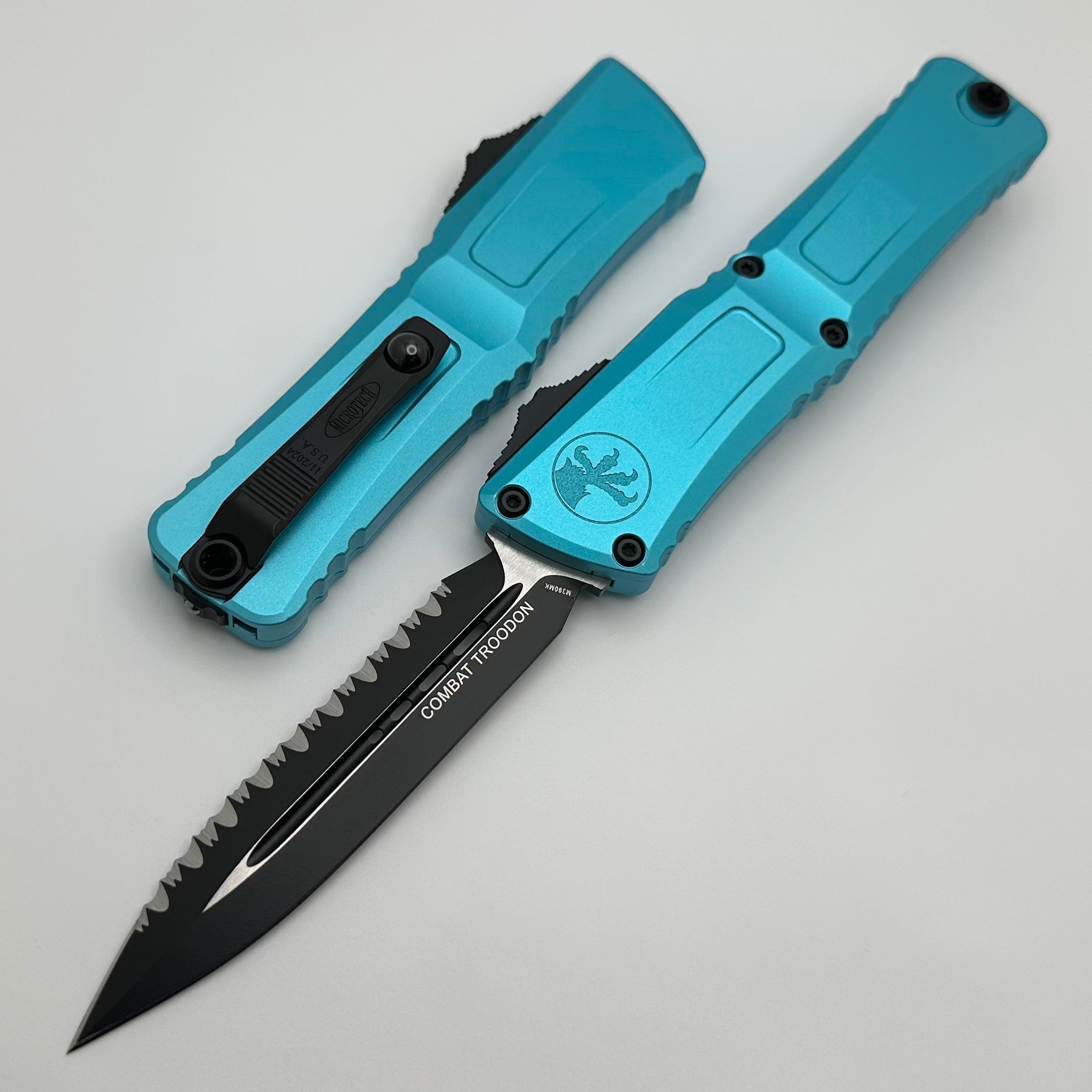 Premium Microtech Combat Troodon Gen III Tactical Knife - Black D/E Full Serrated with Turquoise Handle