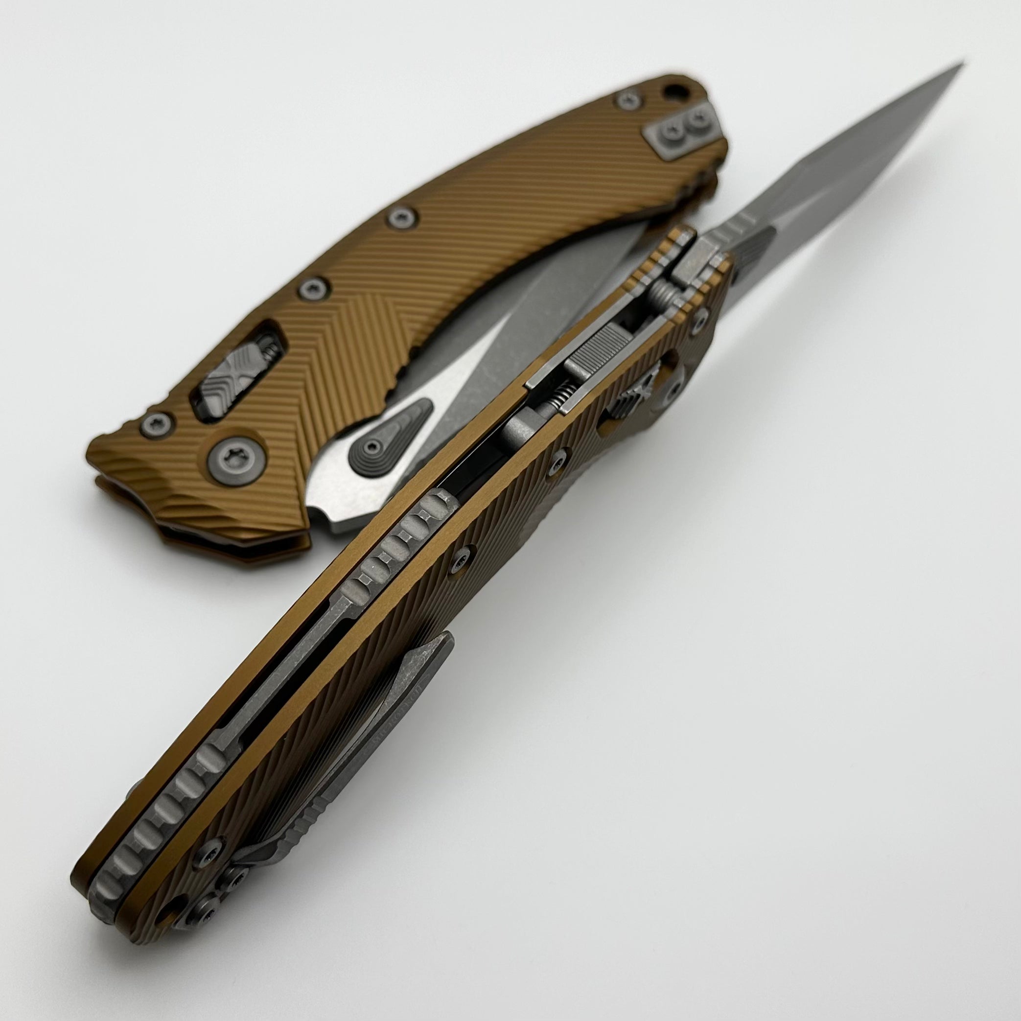 Microtech Amphibian RAM LOK Tan Fluted Aluminum Tactical Knife with Partial Serrated Apocalyptic M390MK Blade