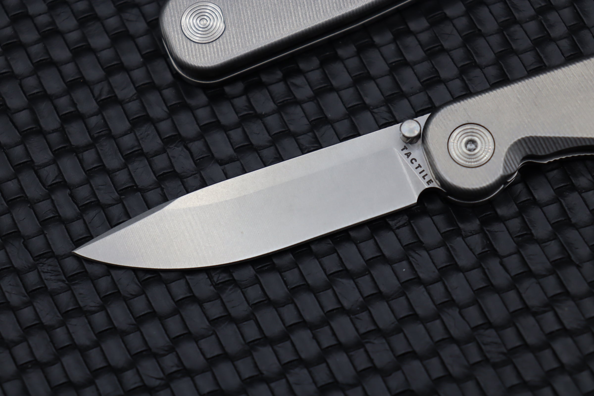 Ultimate Tactile Turn Rockwall Thumbstud Titanium & Magnacut Knife