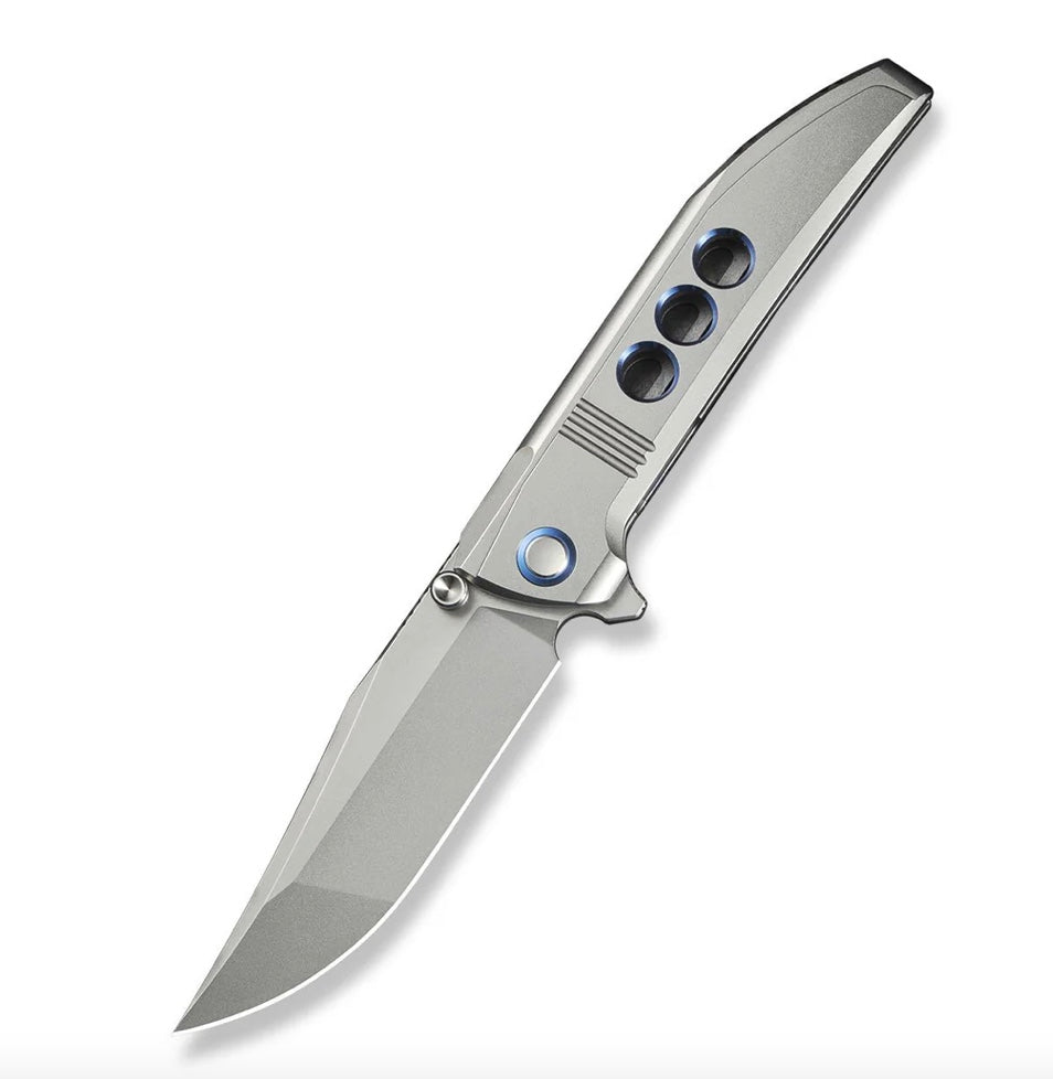 WE Knife Ezinta Flipper: Premium Titanium Integral Handle with Blue Accents & M390 Blade