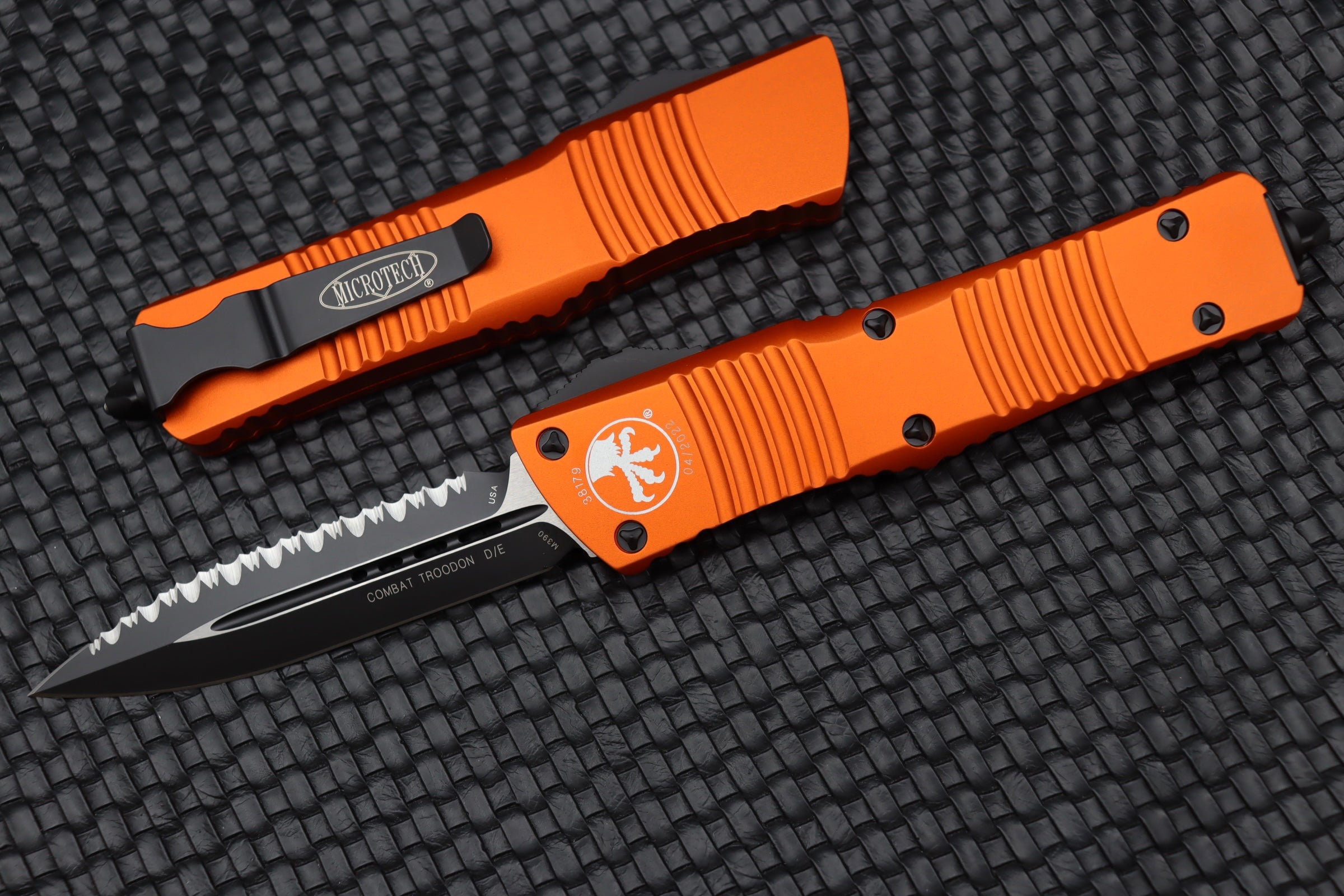 Premium Microtech Combat Troodon - Black Double Edge Fully Serrated & Orange Handle