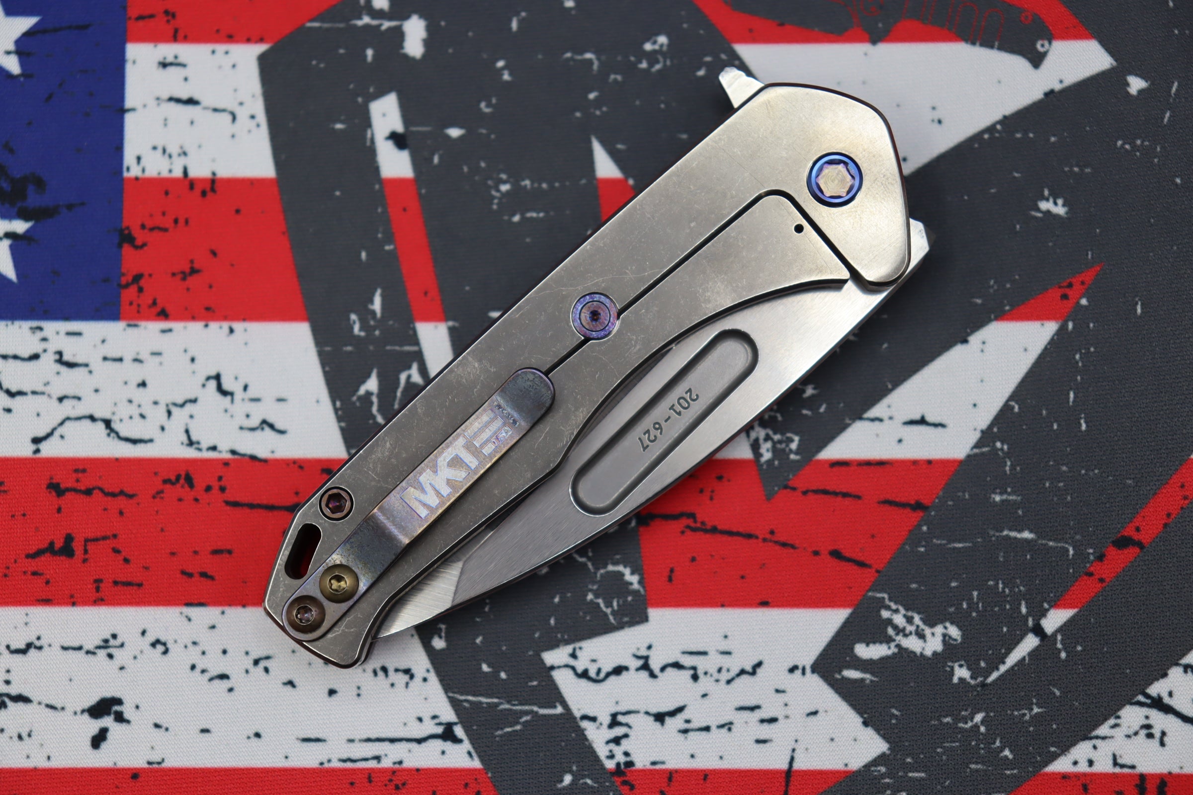 Premium Medford Swift FL Framelock Flipper: Drop Point S35VN Blade & Red Handle with Flamed Hardware