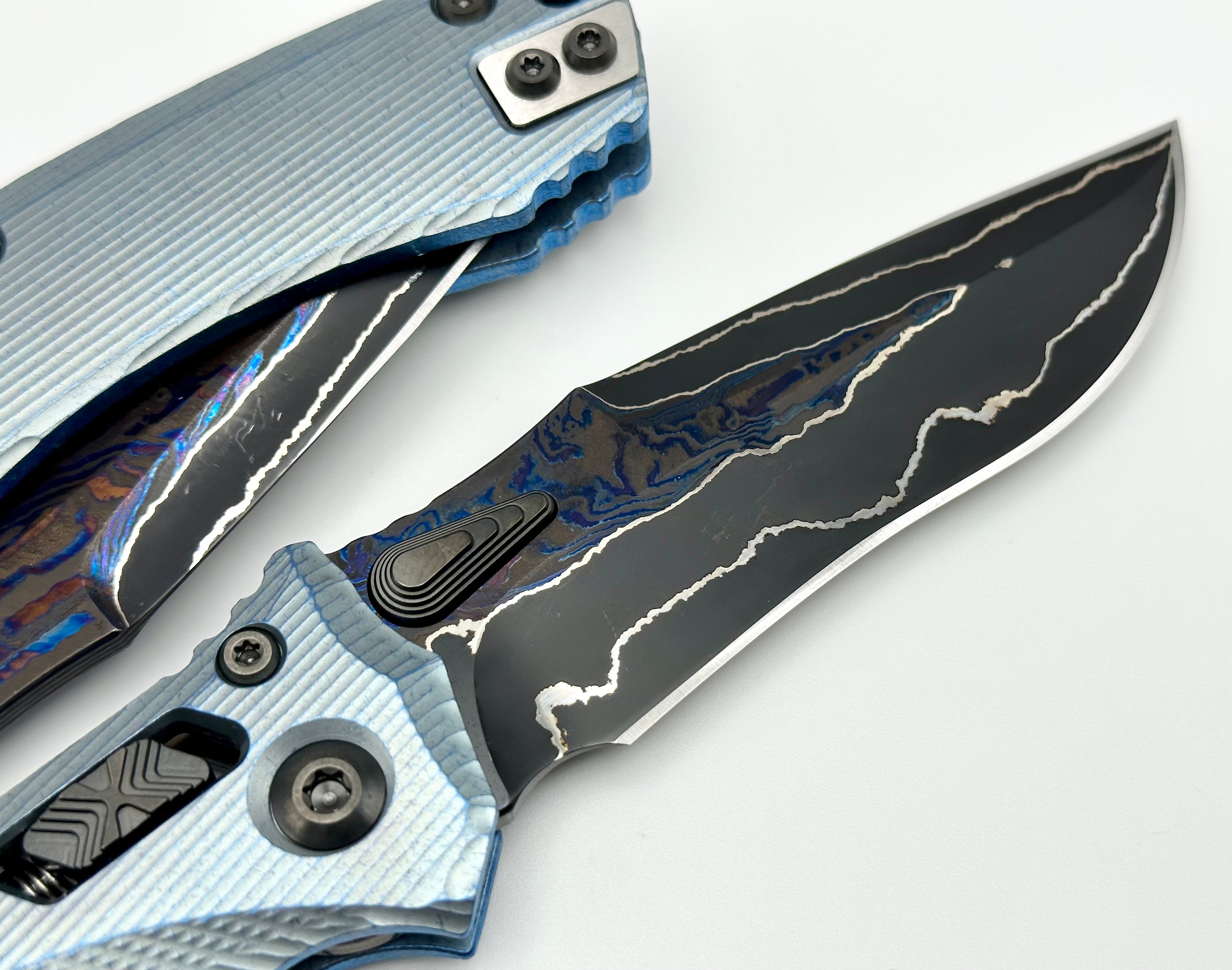 Premium Marfione Custom Knives Amphibian RAM-LOK: Limited Edition Broken Anvil Damascus & Fluted Ice Blue Titanium