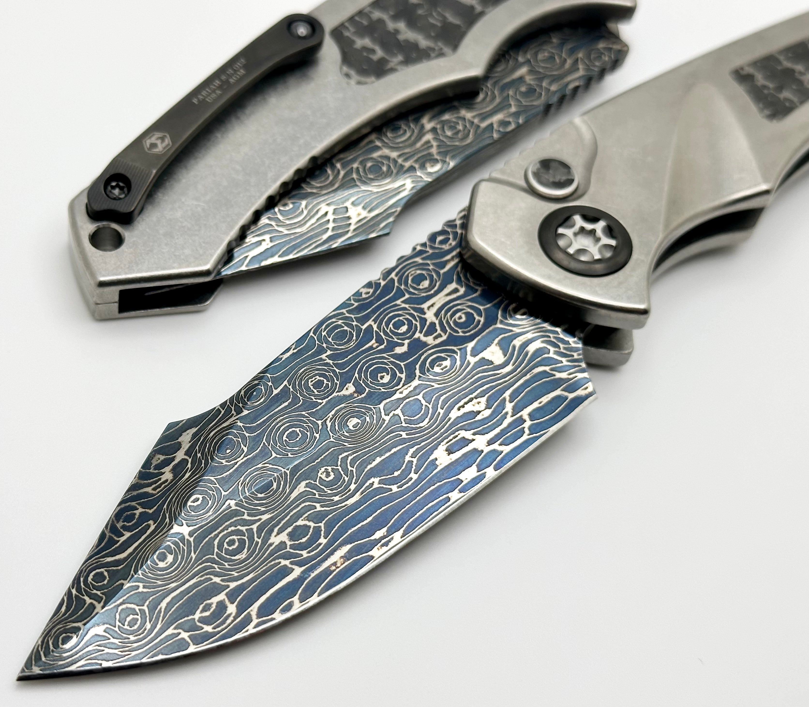 Premium Heretic Knives Pariah Auto: Titanium Custom with Silver Snakeskin Inlay & Blued Vegas Forge Damascus