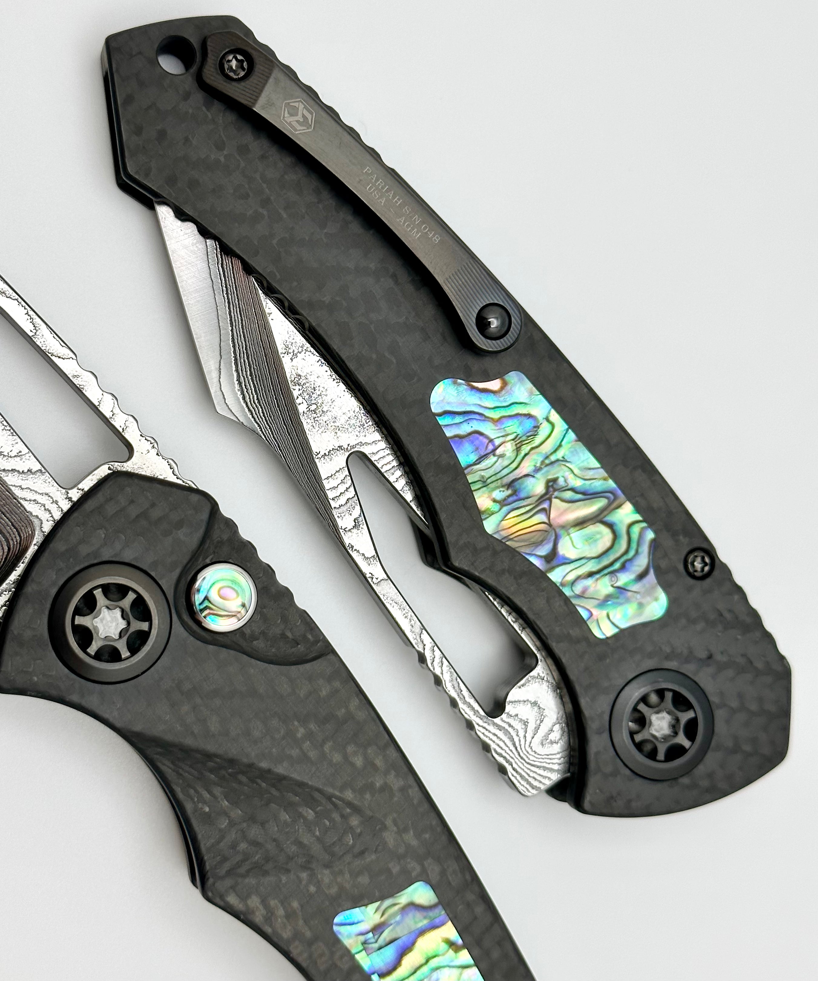 Heretic Knives Pariah Custom Button Lock - Premium Carbon Fiber & Abalone Inlay with Vegas Forge Wood Grain San Mai Damascus