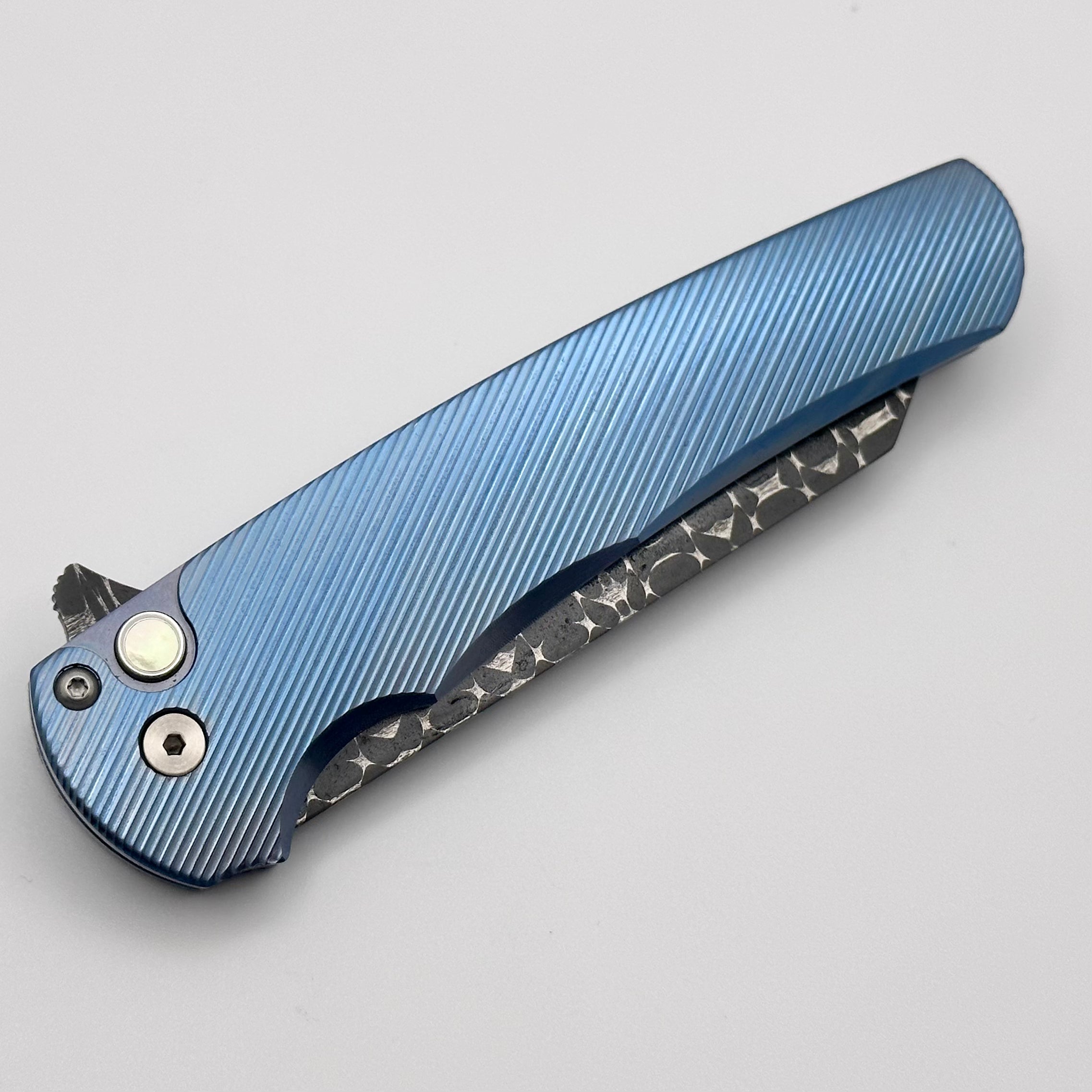 Ultimate Pro-Tech Malibu: Blue Titanium Handle with Pearl Button & Vegas Forge Razorwire Damascus Reverse Tanto Blade