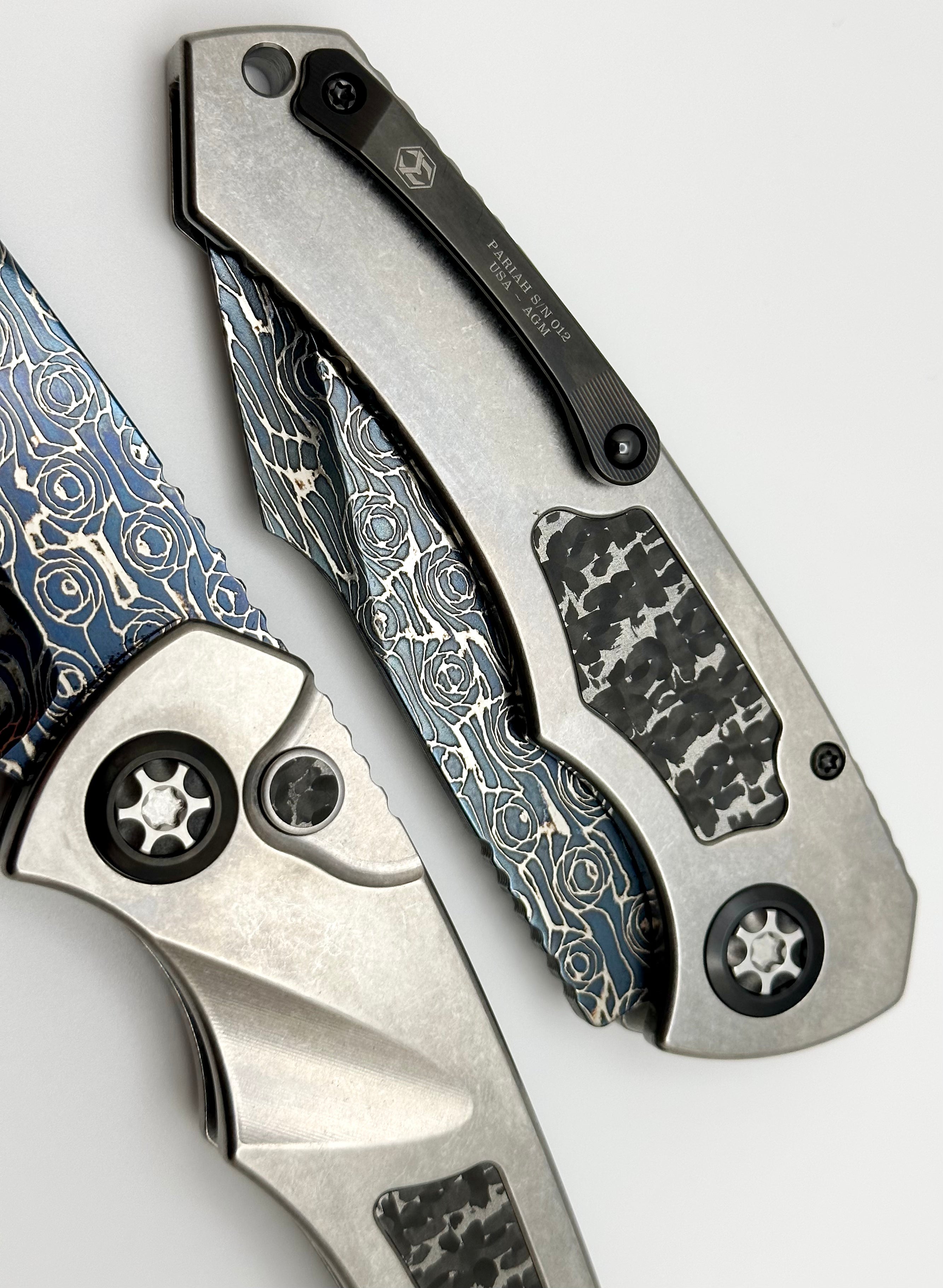 Premium Heretic Knives Pariah Auto: Titanium Custom with Silver Snakeskin Inlay & Blued Vegas Forge Damascus