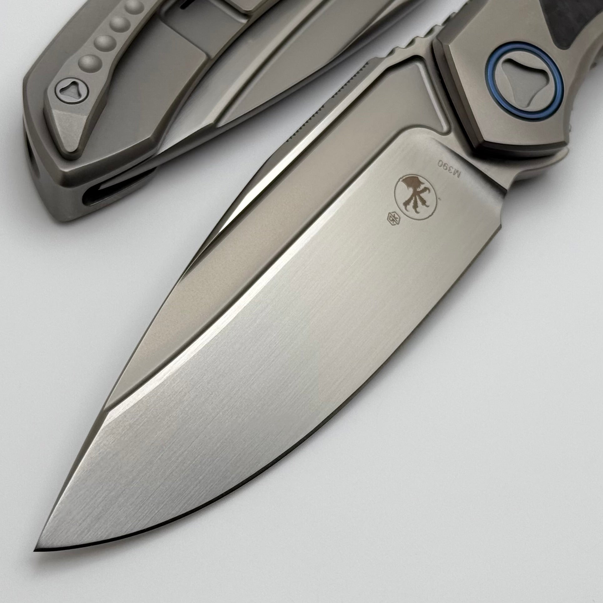 Premium Microtech ANAX Titanium Integral Knife with Carbon Fiber Inlay & Blue Titanium Accents