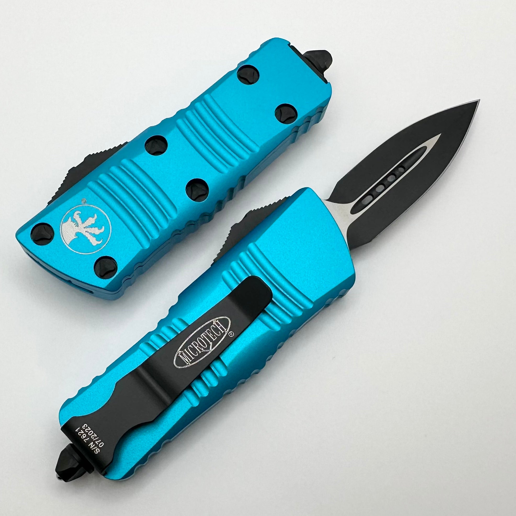 Premium Microtech Troodon Mini OTF Knife - Black & Turquoise Edition